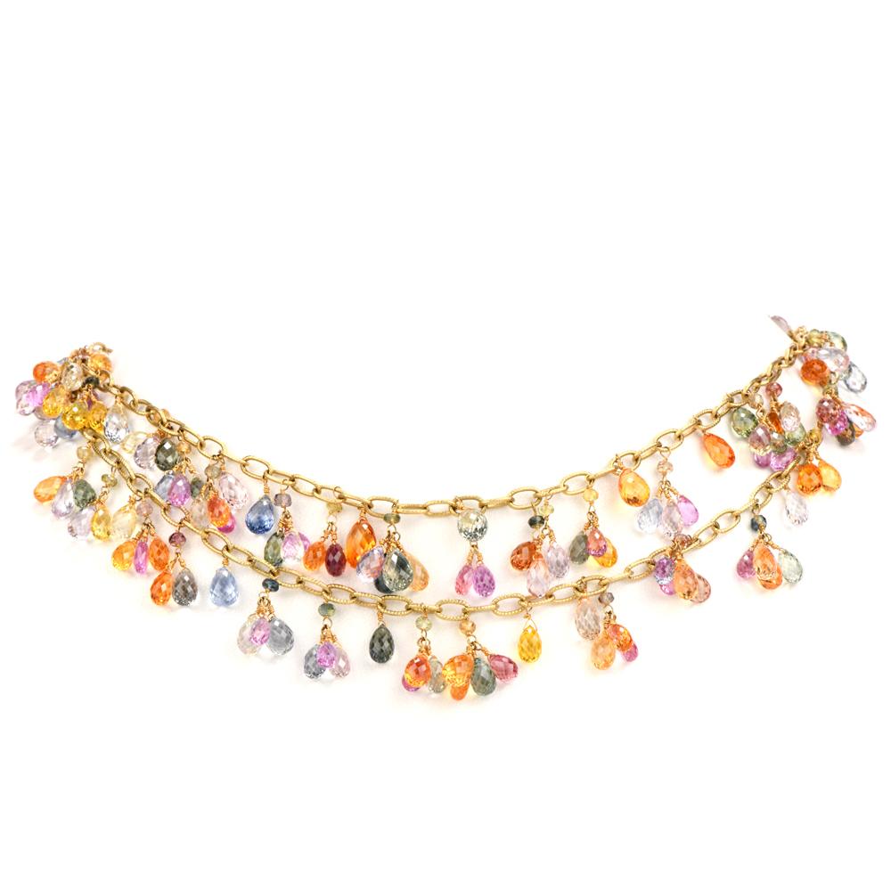 Have the GO TO piece with this  multicolored,

dangling Genuine Sapphire chandelier necklace. 

A variety of briolette cut Sapphires radiate bursts of 

color throughout and is easily worn to match any attire.

119 Sapphire are suspended and dangle