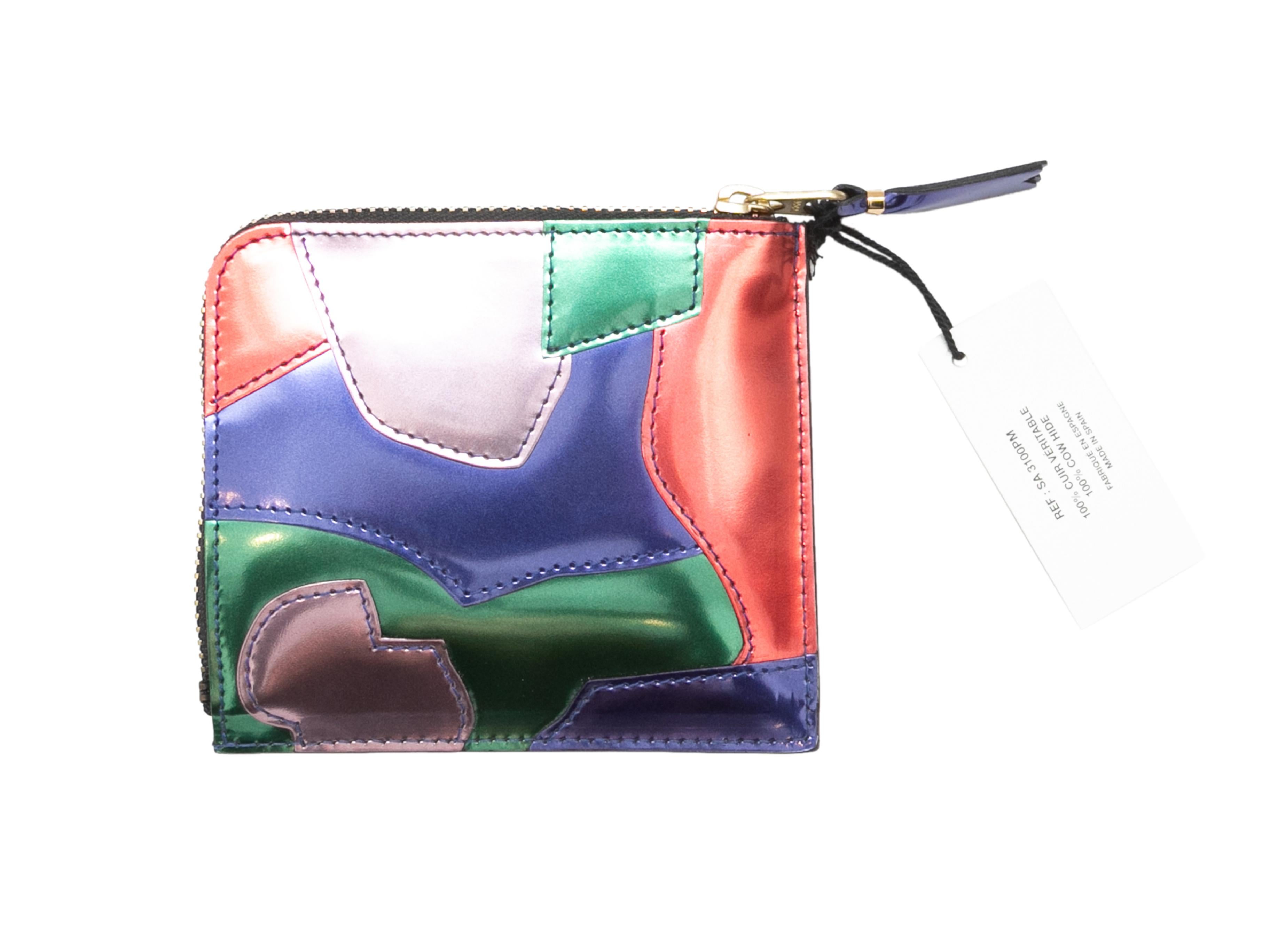 Multicolor metallic patent patchwork leather zip wallet by Comme Des Garcons. Gold-tone hardware. Exterior zip closure. 4