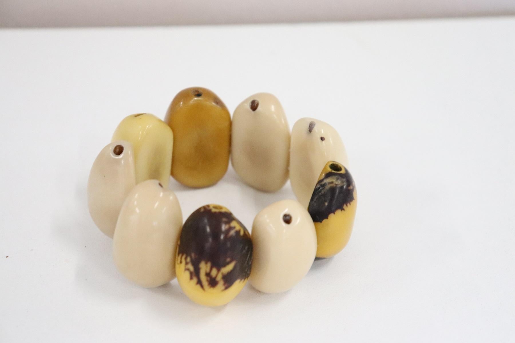 handmade bracelet made of vegetable ivory Tagua. Unique productions young and modern design. Bright colors perfect for a summer day. These jewels are born with total respect for nature. Vegetable ivory allows you to create unique precious jewels