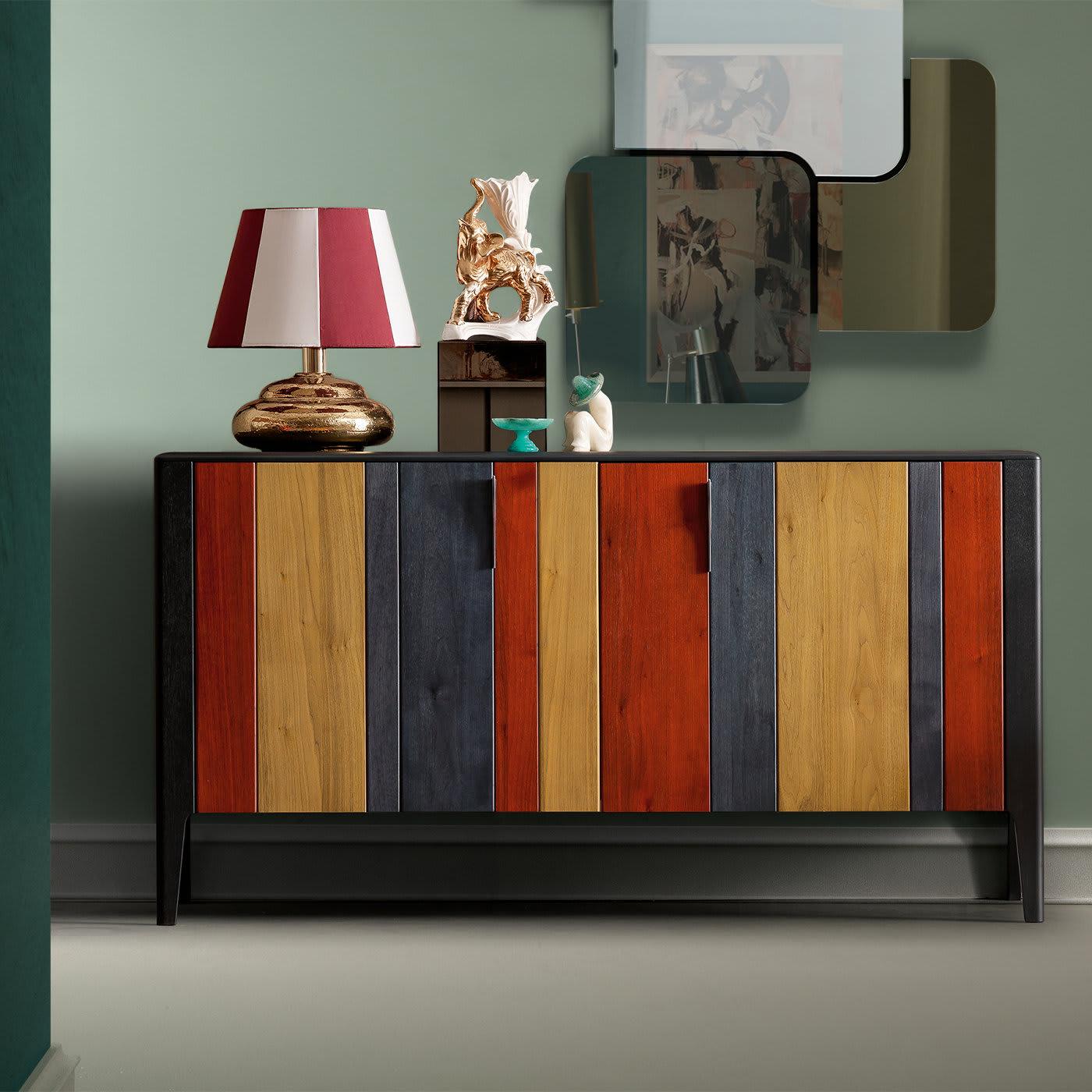 Brighten up an entryway, living room or dining area with the unabashedly colorful Domino Credenza, featuring two Canaletto walnut doors in rich yellow, red and anthracite finishes. The credenza comes complete with inner glass shelves, making it the