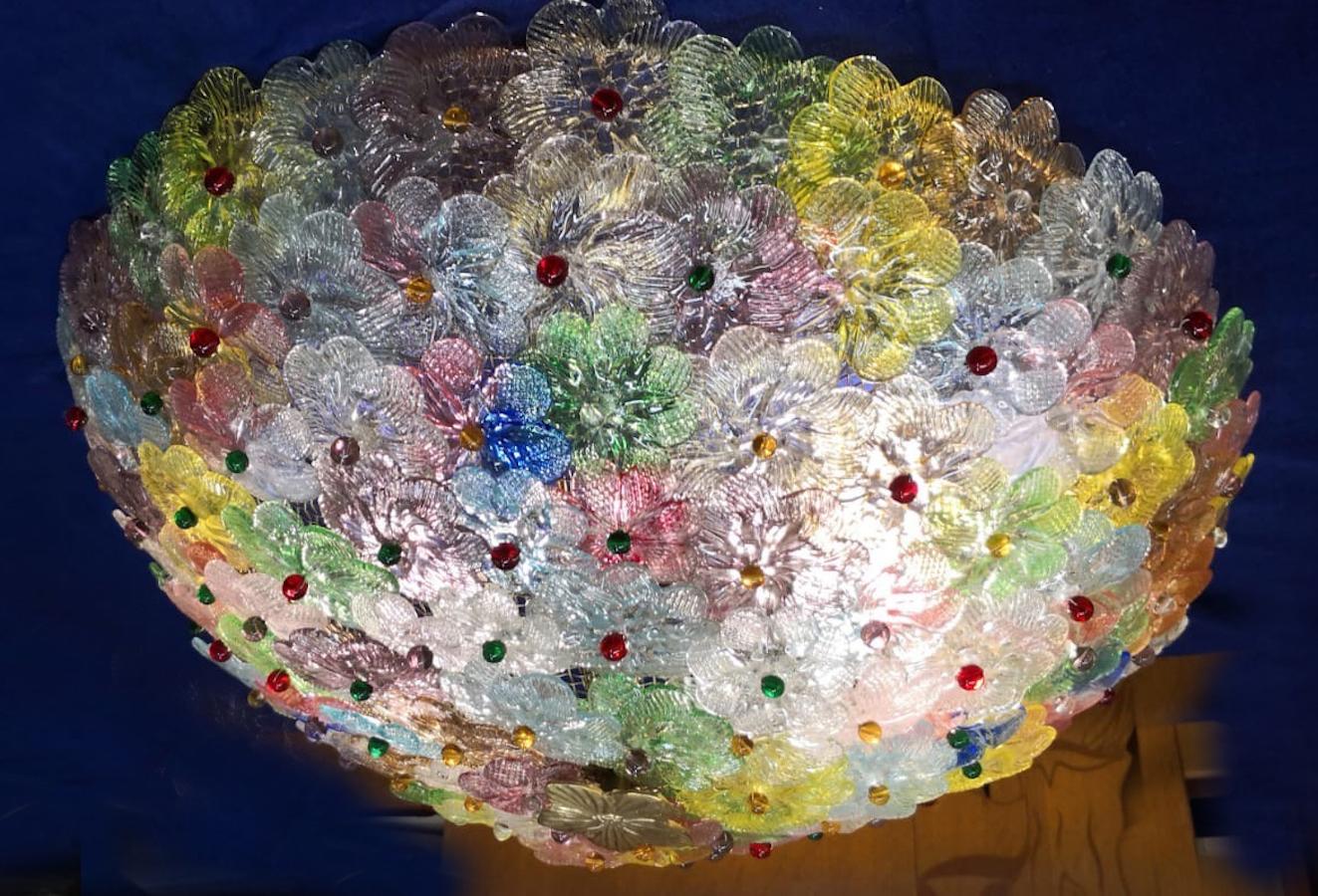 Amazing Mid-Century Modern hand blown Italian flush mount chandelier featuring overlapping  multicolor crystal flowers, mounted on a webbed white painted frame.

Measures: Height
9.45 in. (24 cm).
Diameter
23.62 in. (60 cm).
5 x E27 \ 4 watt light
