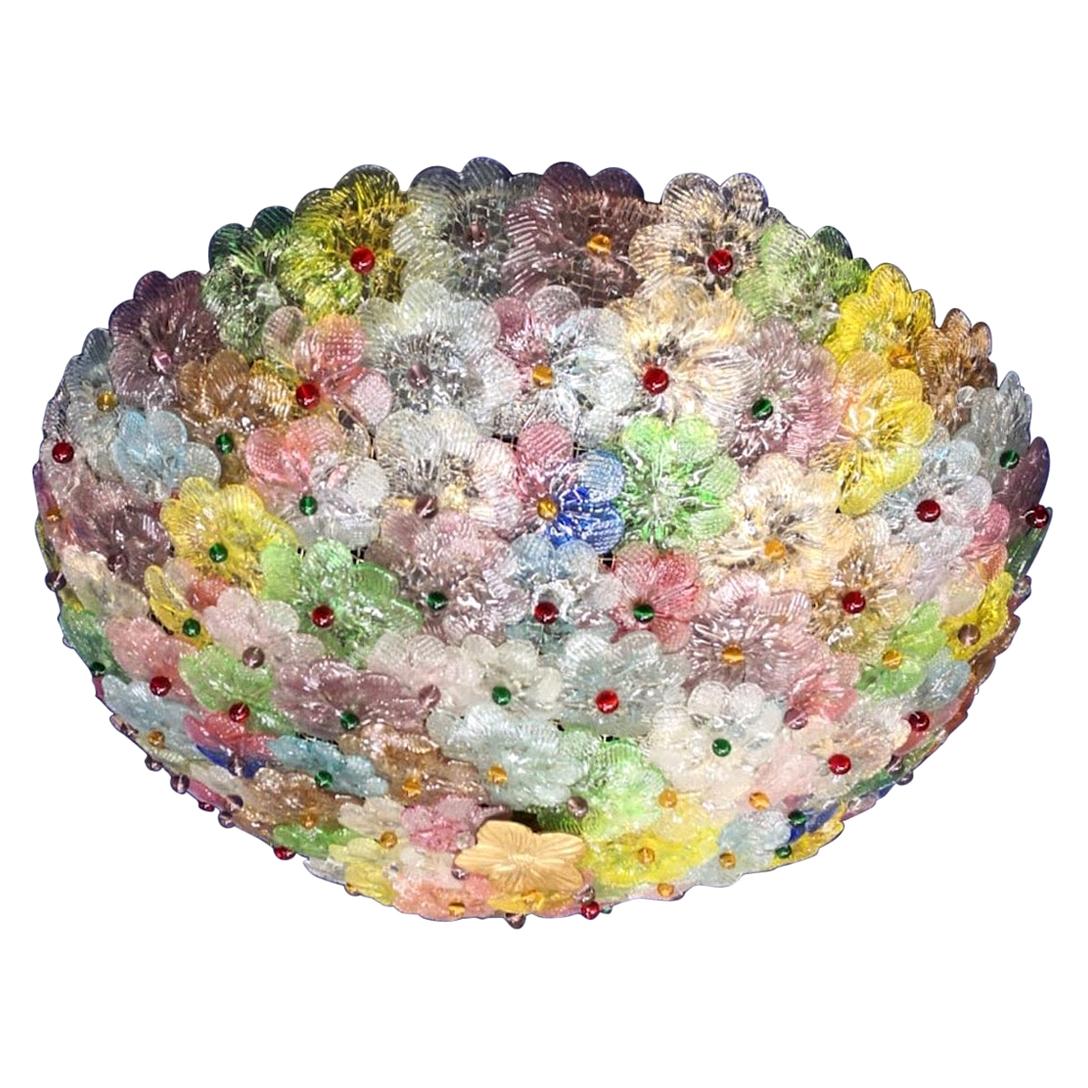 Amazing Mid-Century Modern hand blown Italian flush mount chandelier featuring overlapping multi-color crystal flowers, mounted on a webbed white painted frame.
available also a pair and a pair of sconces.
Measures: Height
9.45 in. (24
