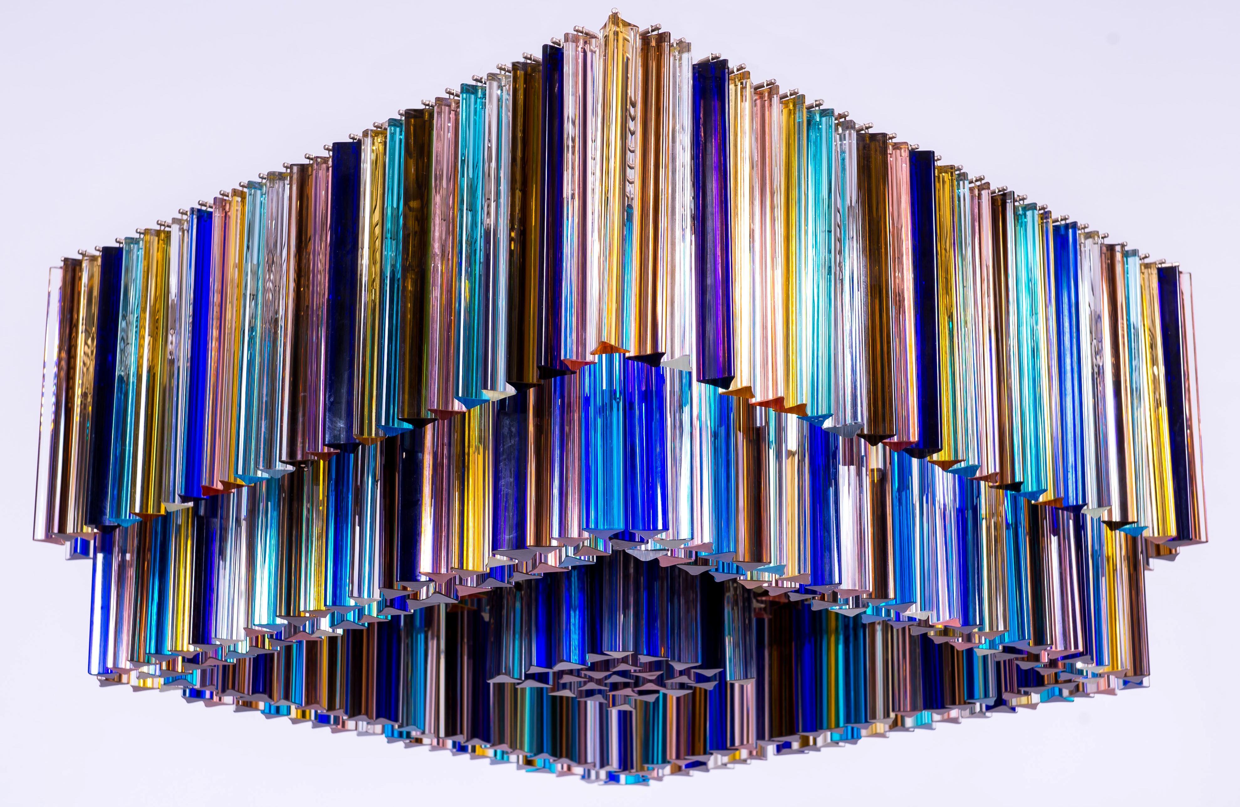Italian Flush Mount in Murano Glass Multi color Elements by Giovanni Dalla Fina
This outstanding massive Murano glass flush mount celebrates the beauty of colors and the perfection of geometrical shapes. A total of 489 multicolored ”triedro”