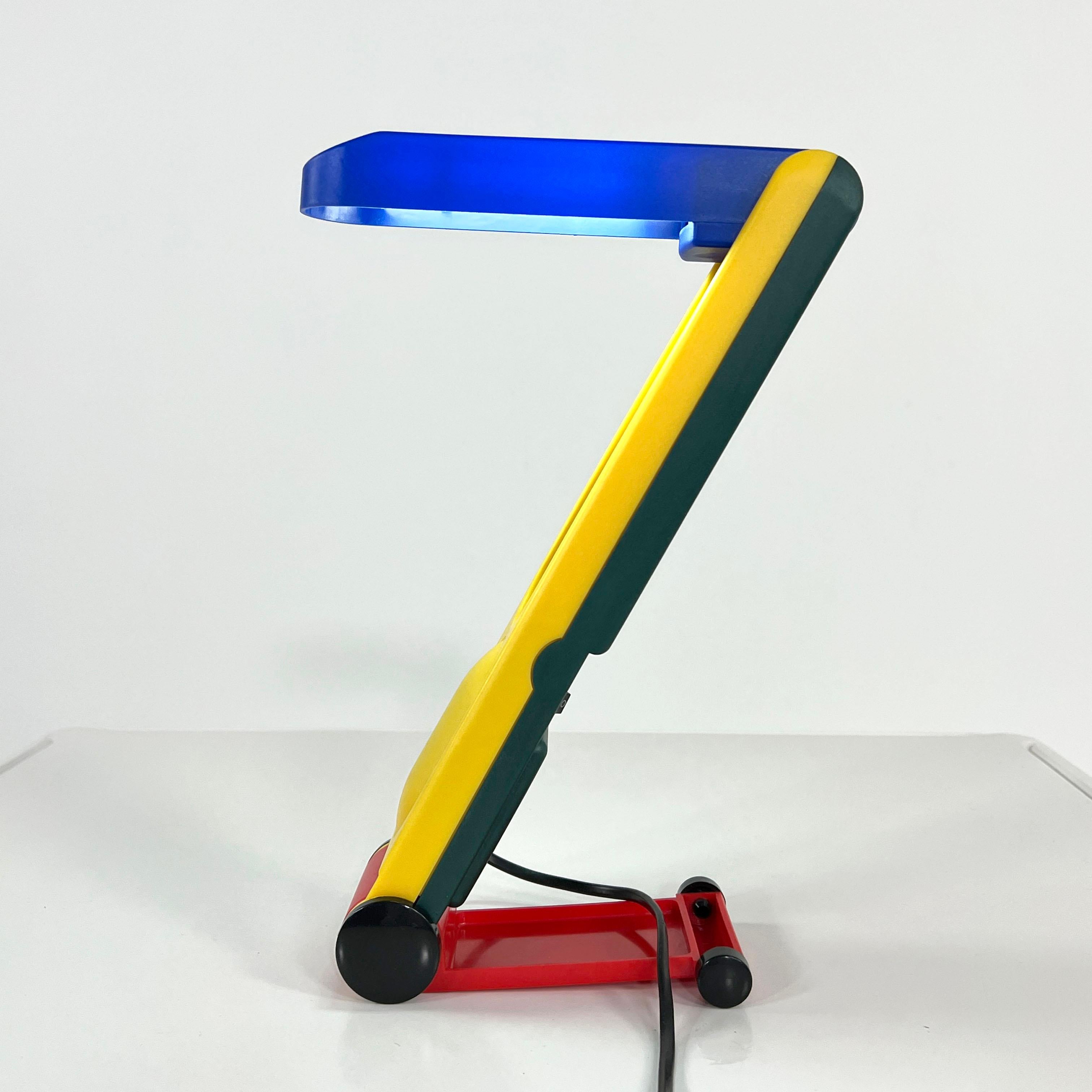Multicolor Folding Table Lamp from Benetton Italy, 1980s
Producer - Benetton Italy
Design Period - Eighties
Measurements - Width 8 cm x Depth 30 cm x Height 42 cm
Materials - Plastic
Color - Yellow, blue, red, green
Light wear consistent with