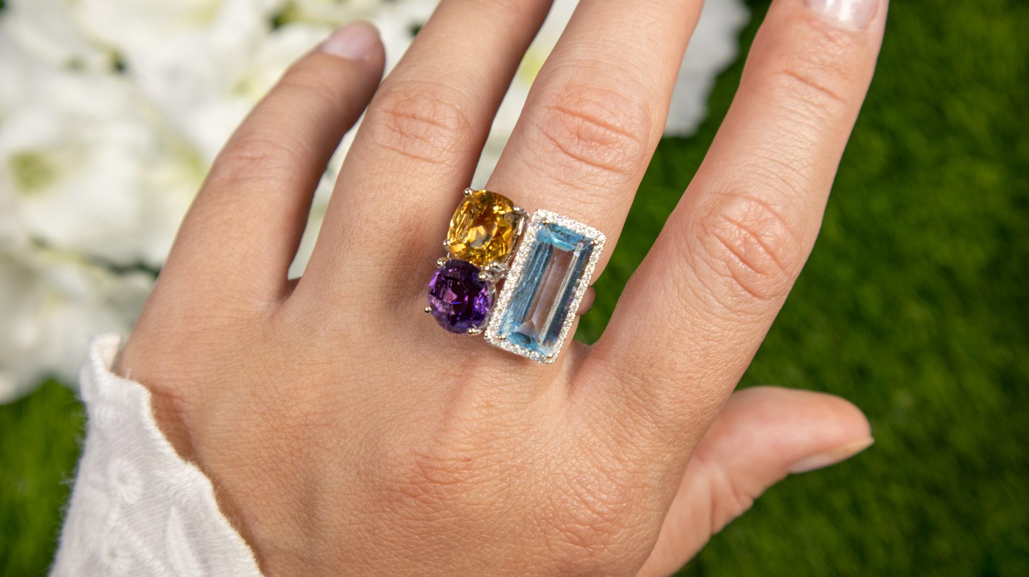 It comes with the Gemological Appraisal by GIA GG/AJP
All Gemstones are Natural
Citrine, Amethyst, Aquamarine = 10.30 Carats
Cut: Mixed Cut
Diamonds = 0.21 Carats
Metal: 14K White Gold
Ring Size: 7* US
*It can be resized complimentary