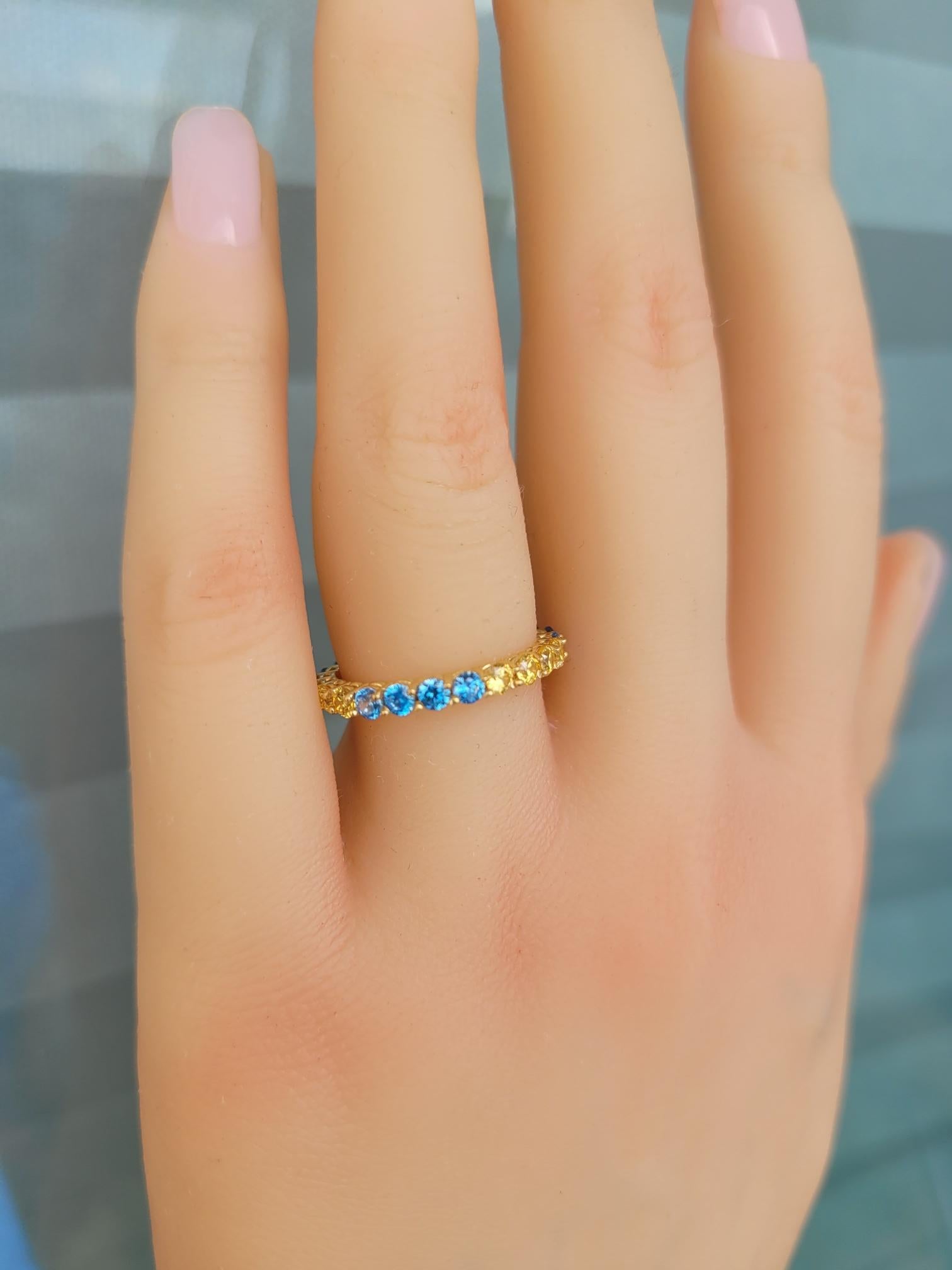 in vendita:  Anello eternità con pietre multicolori in oro 14k 5