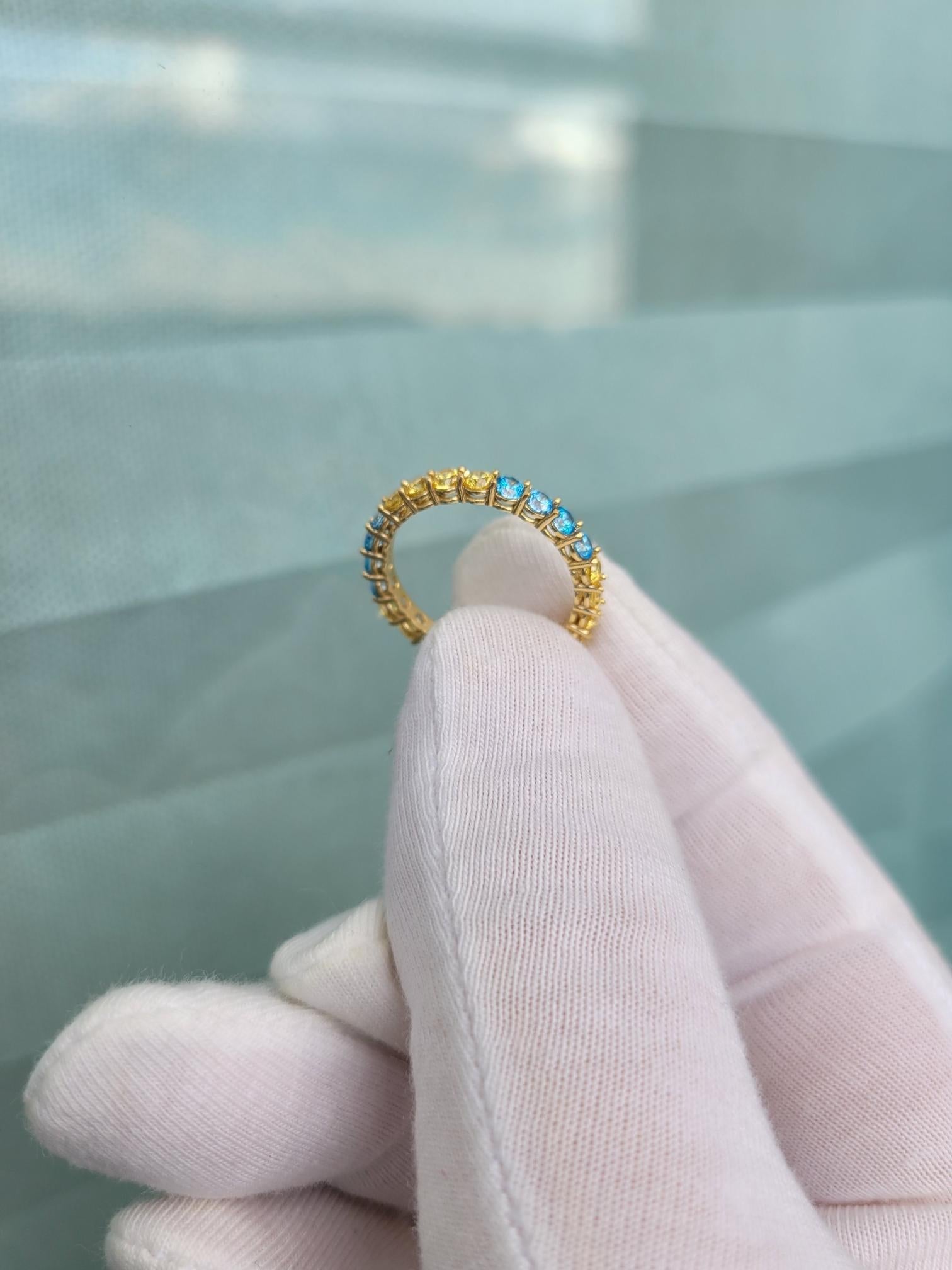 in vendita:  Anello eternità con pietre multicolori in oro 14k 7