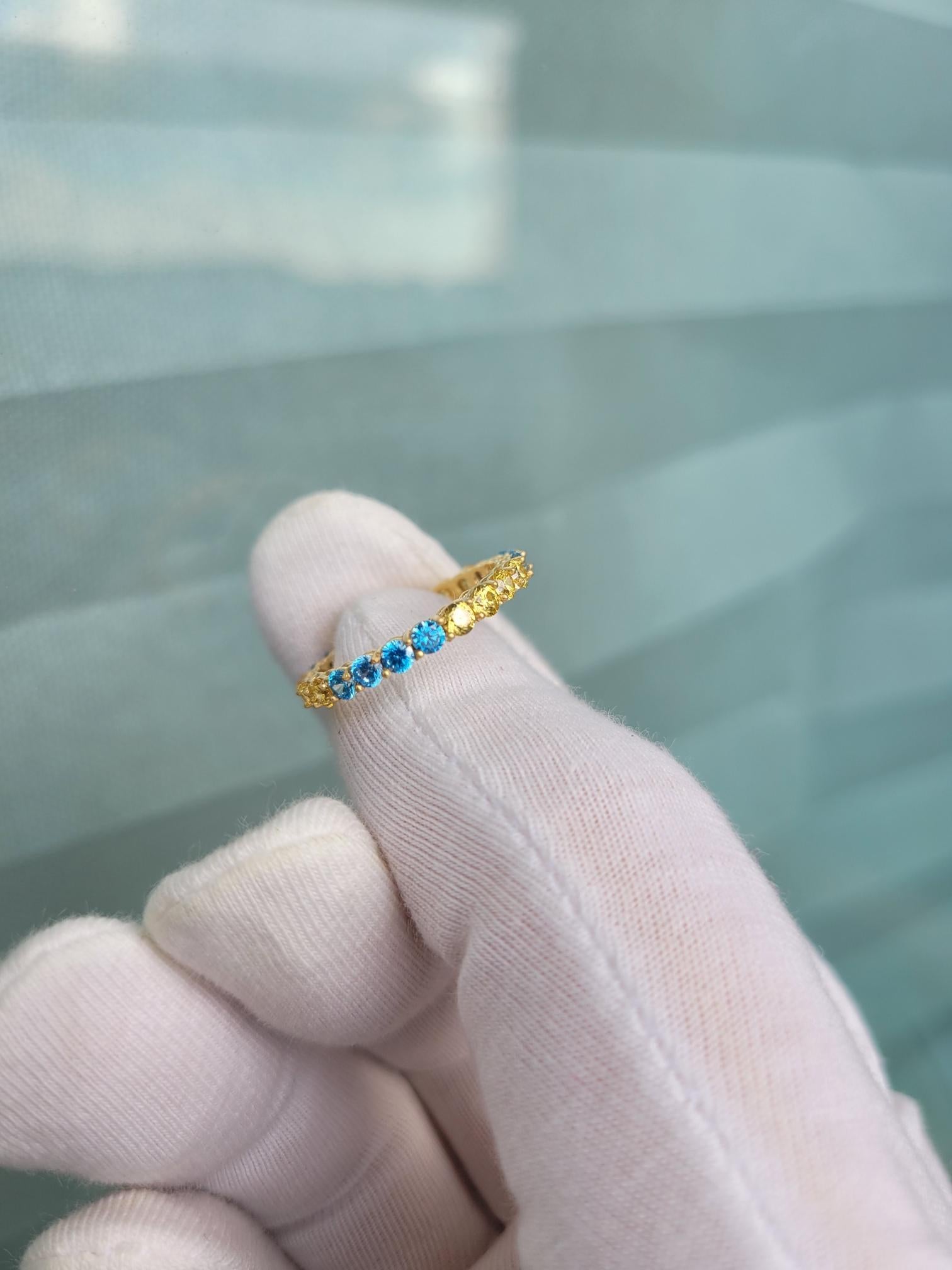 in vendita:  Anello eternità con pietre multicolori in oro 14k 9