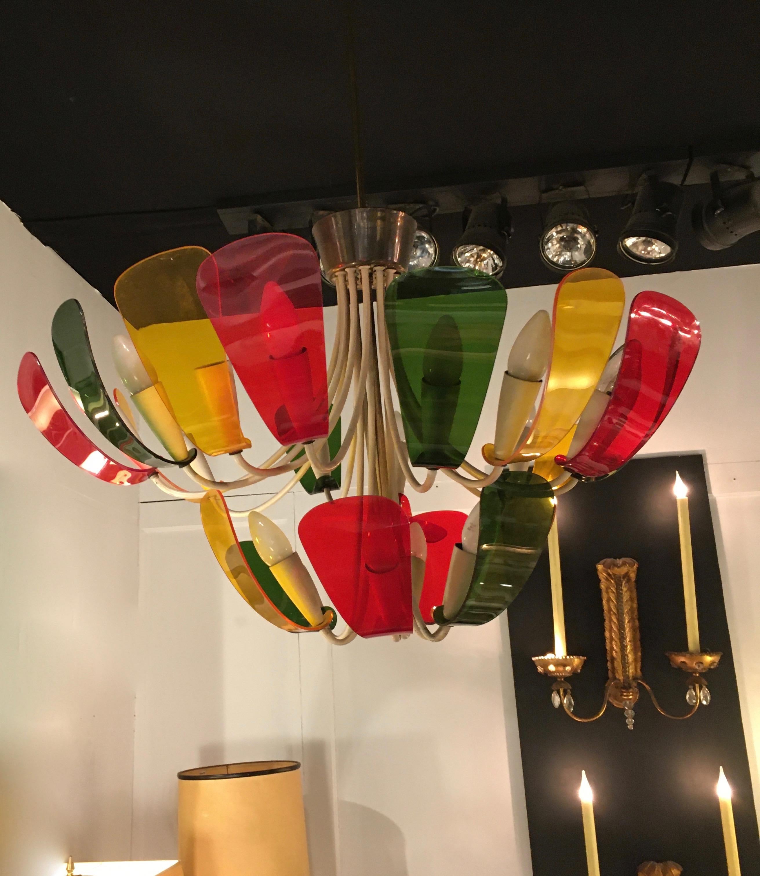 Spectacular and colorful 18 lights chandelier by Stilux, Italy 1950.
The chandelier is adjustable.