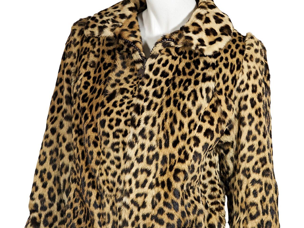 Product details:  Multicolor leopard-print fur bomber jacket.  Spread collar.  Long sleeves.  Concealed zip-front closure.  30