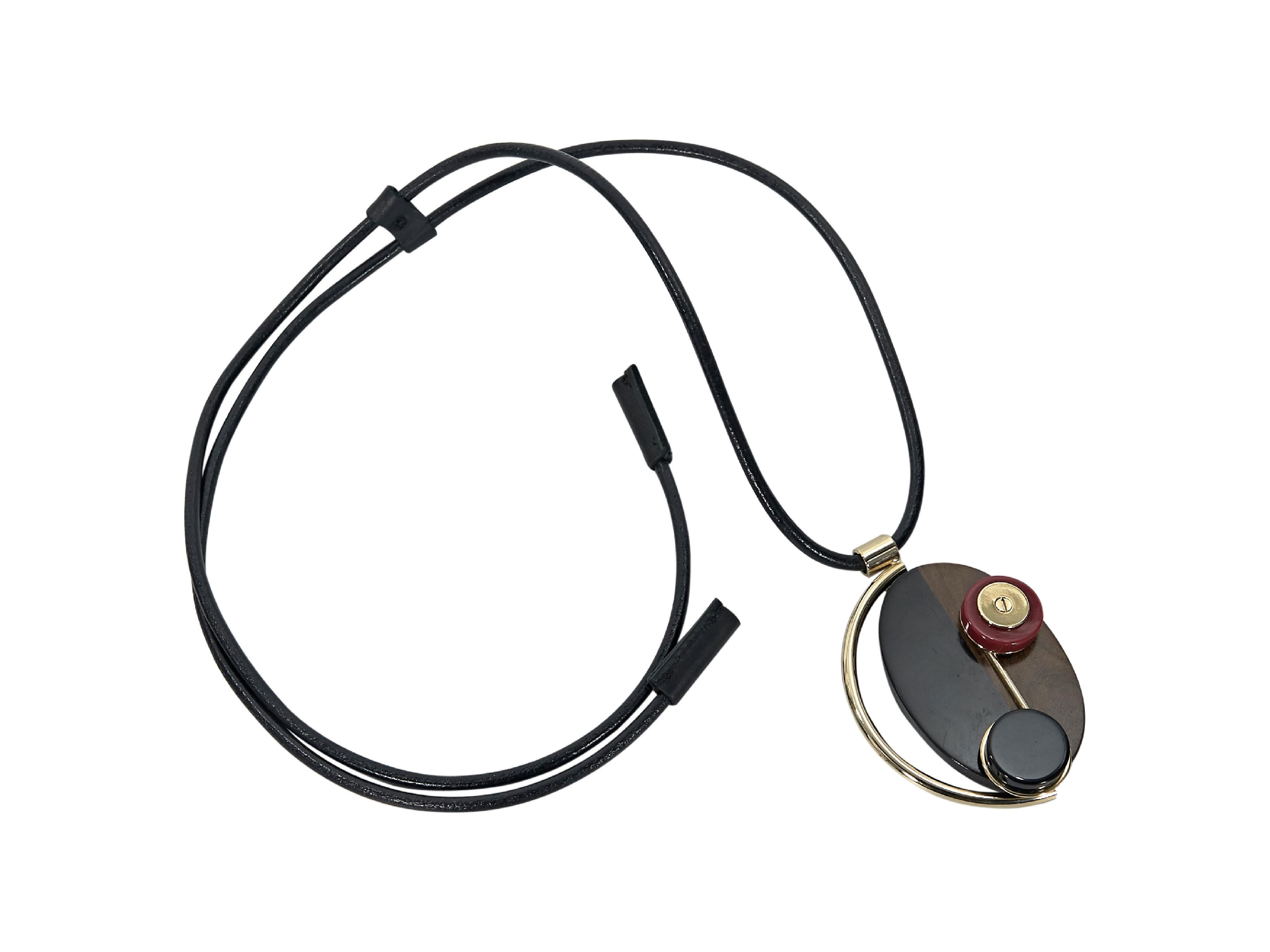 Product details:  Multicolor circular geometric statement necklace by Marni.  Self-tie closure.  Goldtone hardware.  20