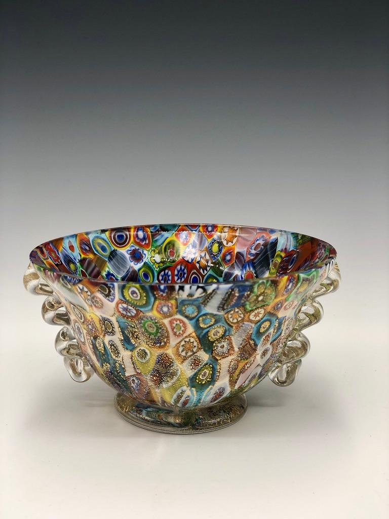 Vibrant multicolored millefiori Murano glass bowl with clear glass squiggle handles by Vinciprova, Italy. Original manufacturer's label, 