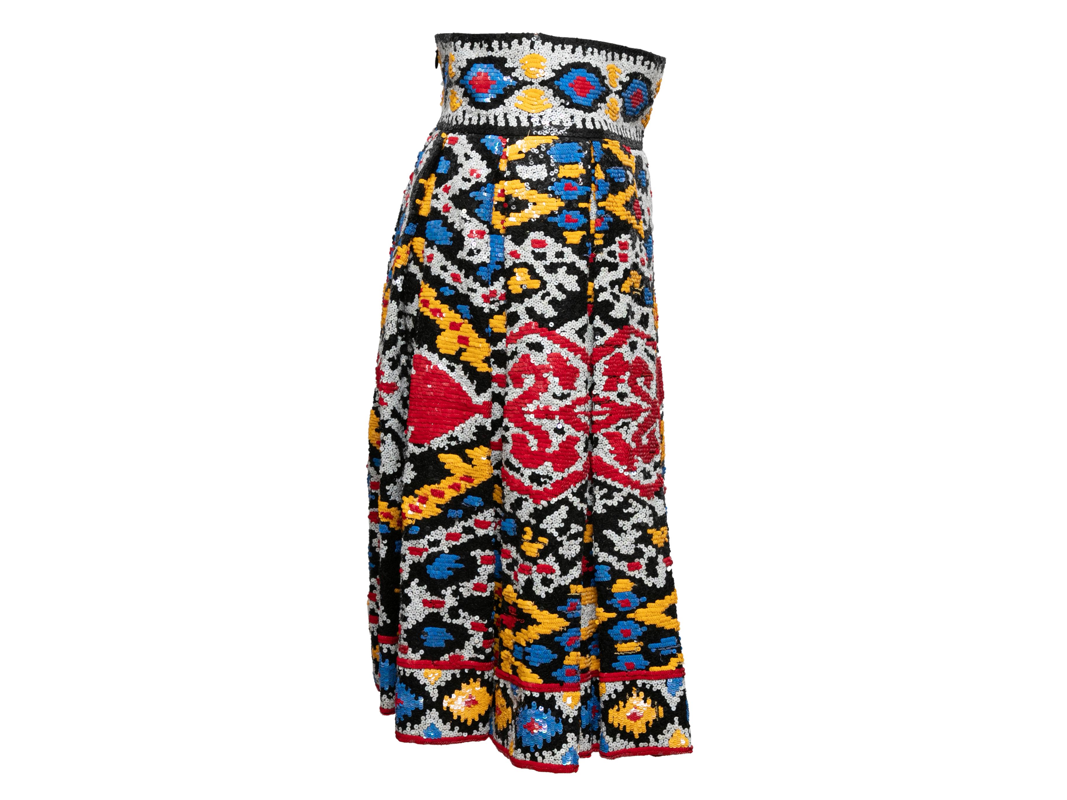 Multicolor silk pleated sequin-embellished skirt by Naeem Khan. Abstract pattern throughout. Zip closure at back. 29
