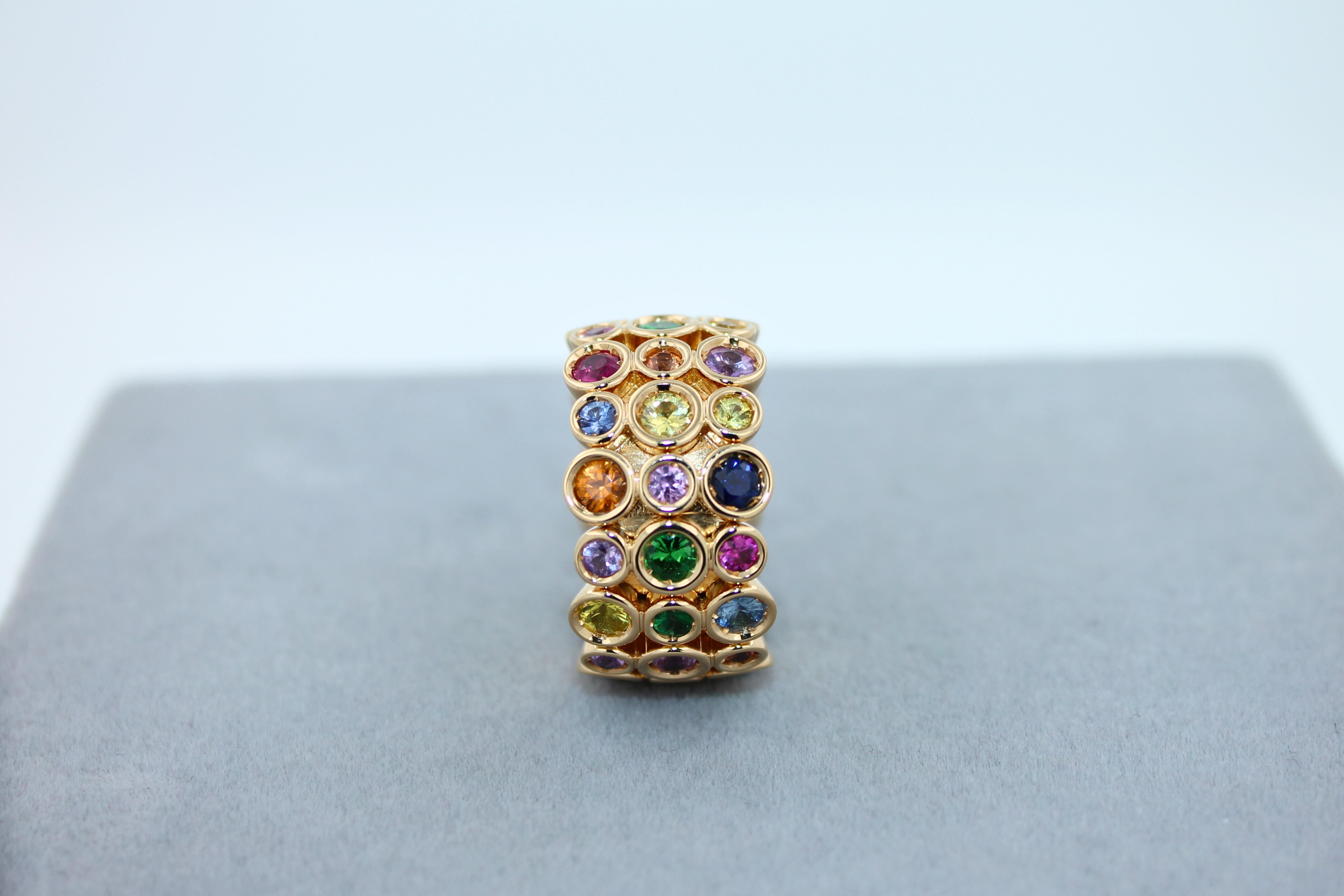 Women's or Men's Multicolor Rainbow Sapphire Gemstone Bezel Eternity Band 18K Yellow Gold Ring For Sale
