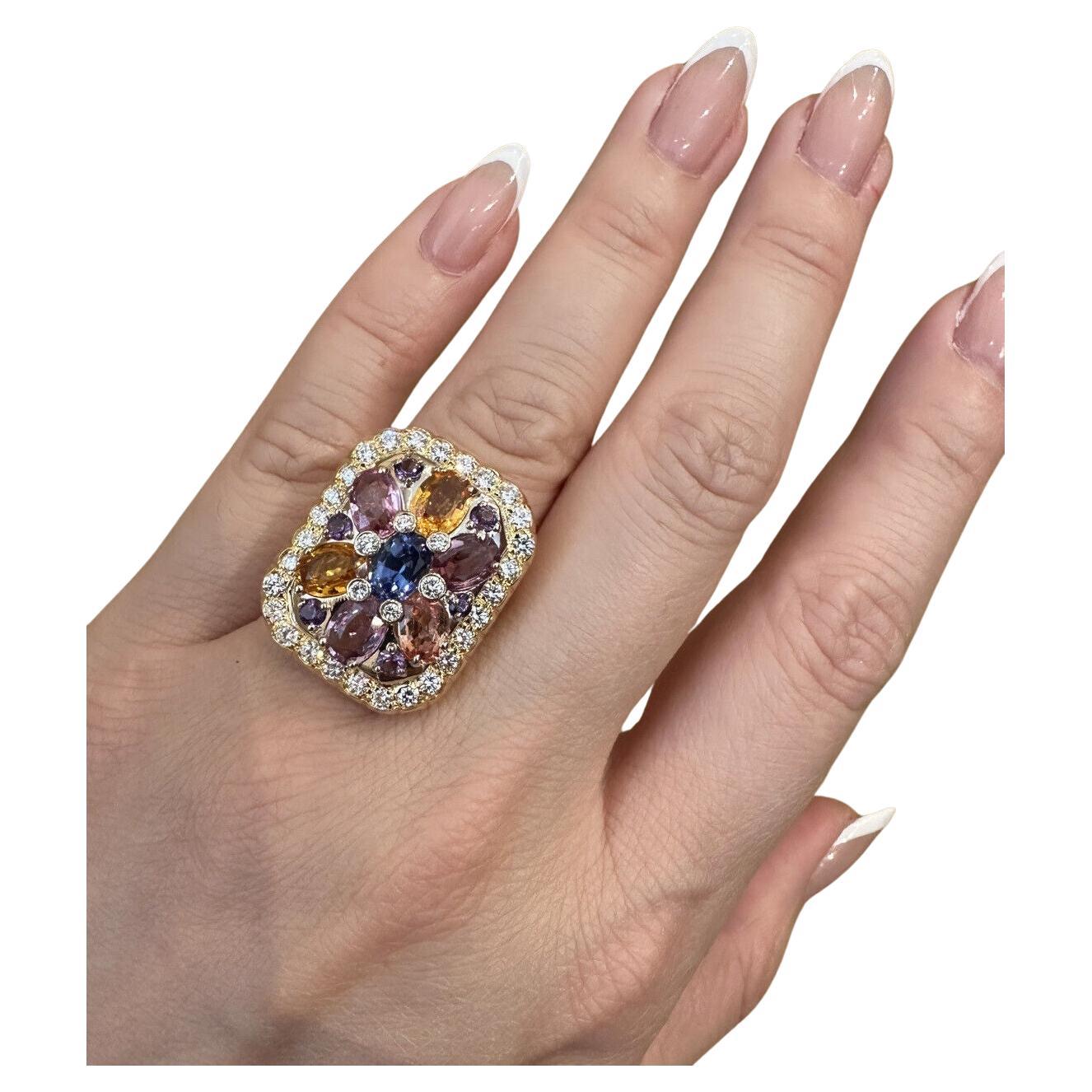 Multicolor Sapphire & Diamond Large Cocktail Ring in 18k Yellow Gold 

Sapphire and Diamond Ring features Clusters of  Blue, Pink, and Orange Natural Oval Sapphires set with Round Brilliant Diamonds and Round Purple Amethysts set in 18k Yellow