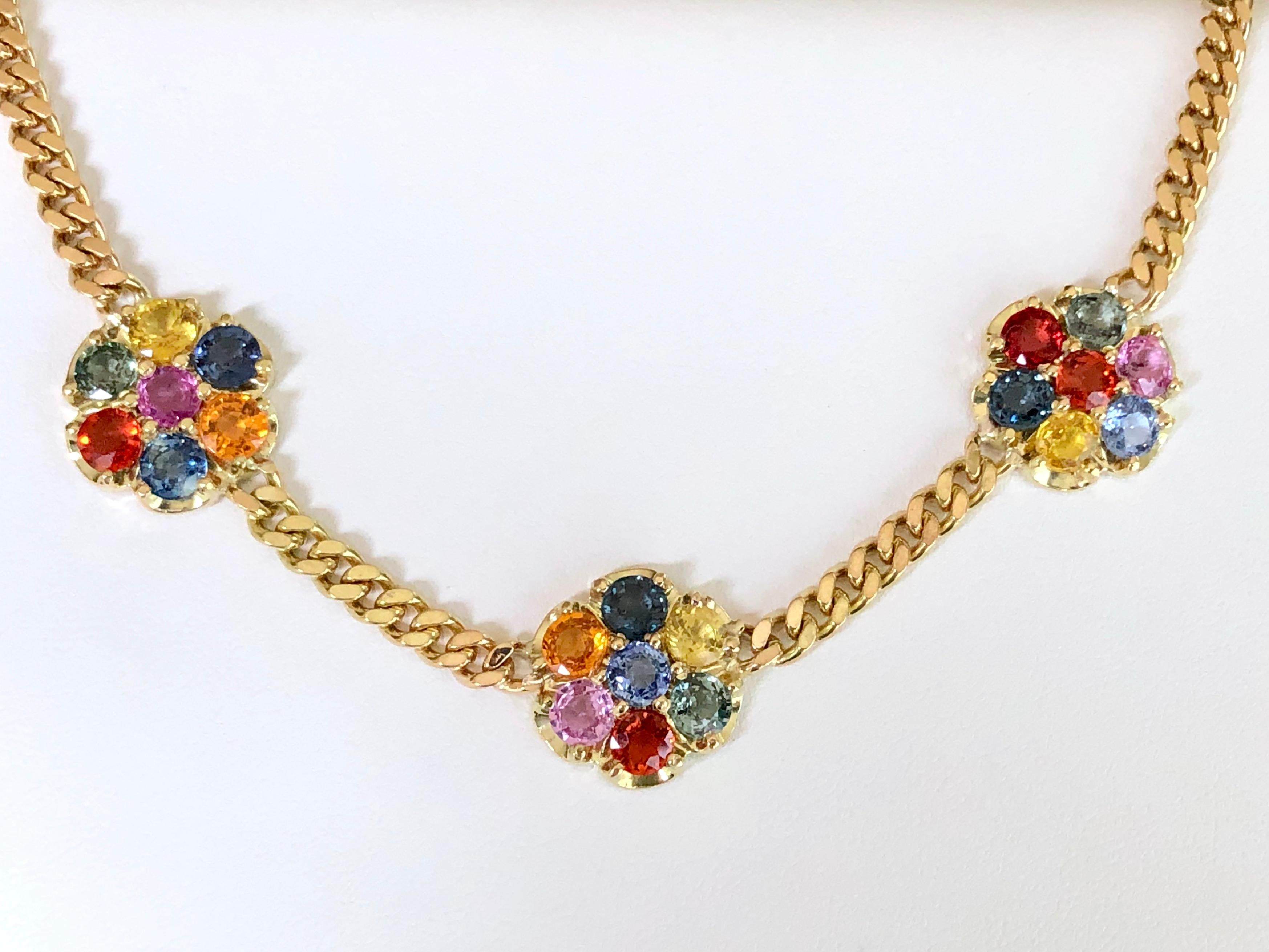 13.50 Carat Multicolor Sapphire Chain Link Necklace 18K
Remains of the most iconic collections!
The 18k yellow gold chain link necklace is set with three large flowers of various colors of natural faceted round sapphires in bright pink, blue, green,