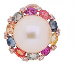 Boucles d'oreilles en or rose 14 carats avec saphirs multicolores, perles, rubis et diamants.