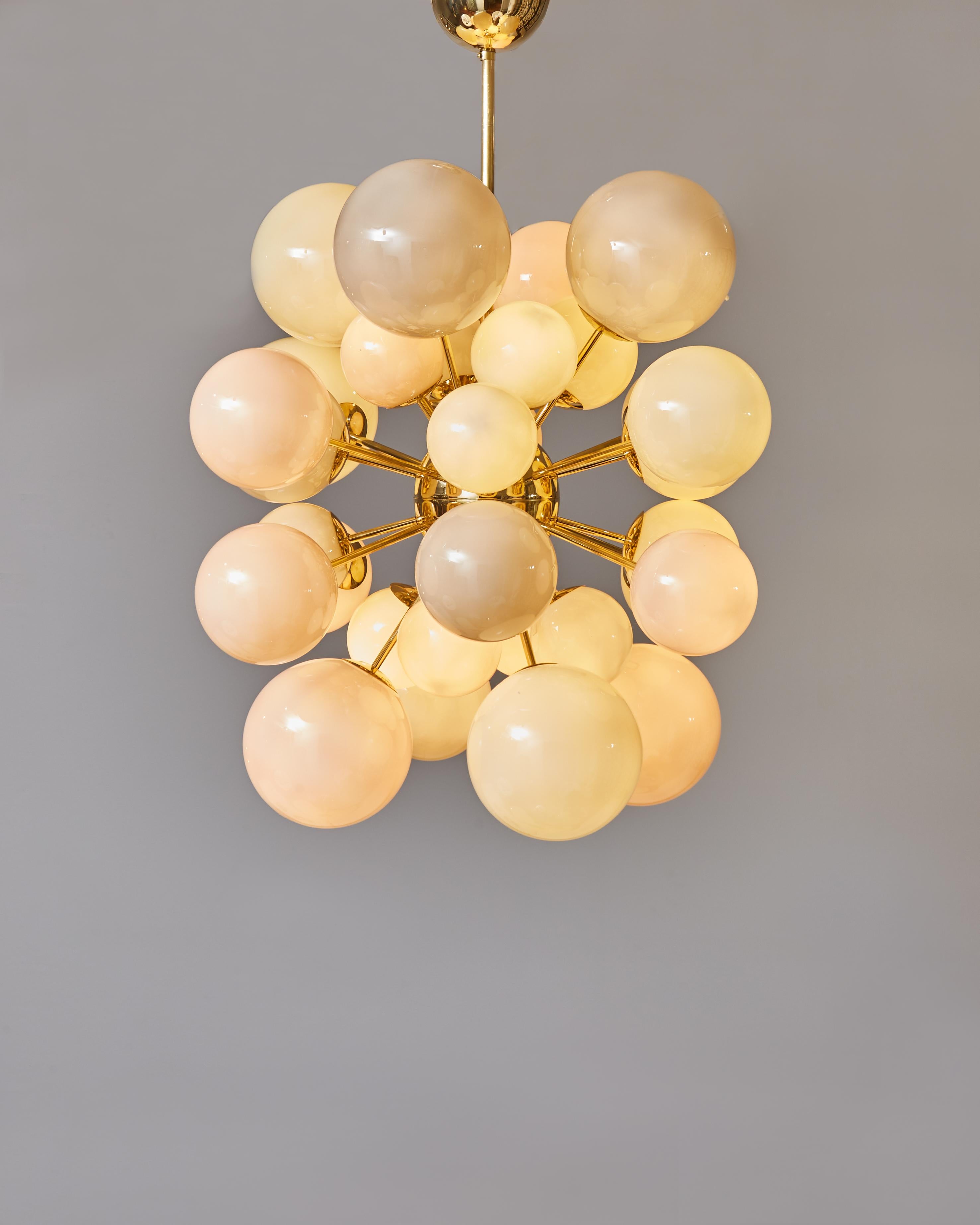 Superb sputnik chandelier in bras with multicolored opaline glass globes by Studio Glustin.
 