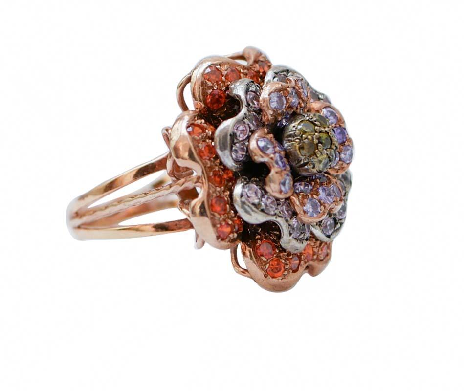 Cocktail ring in 9kt rose gold and silver structure studded with multi-colored stones.
This ring is totally handmade by Italian master goldsmiths and it is in perfect conditions.
Stones 1.30 gr
Total Weight 11.30 gr
RF *GAER
Italian Size 16
Usa Size
