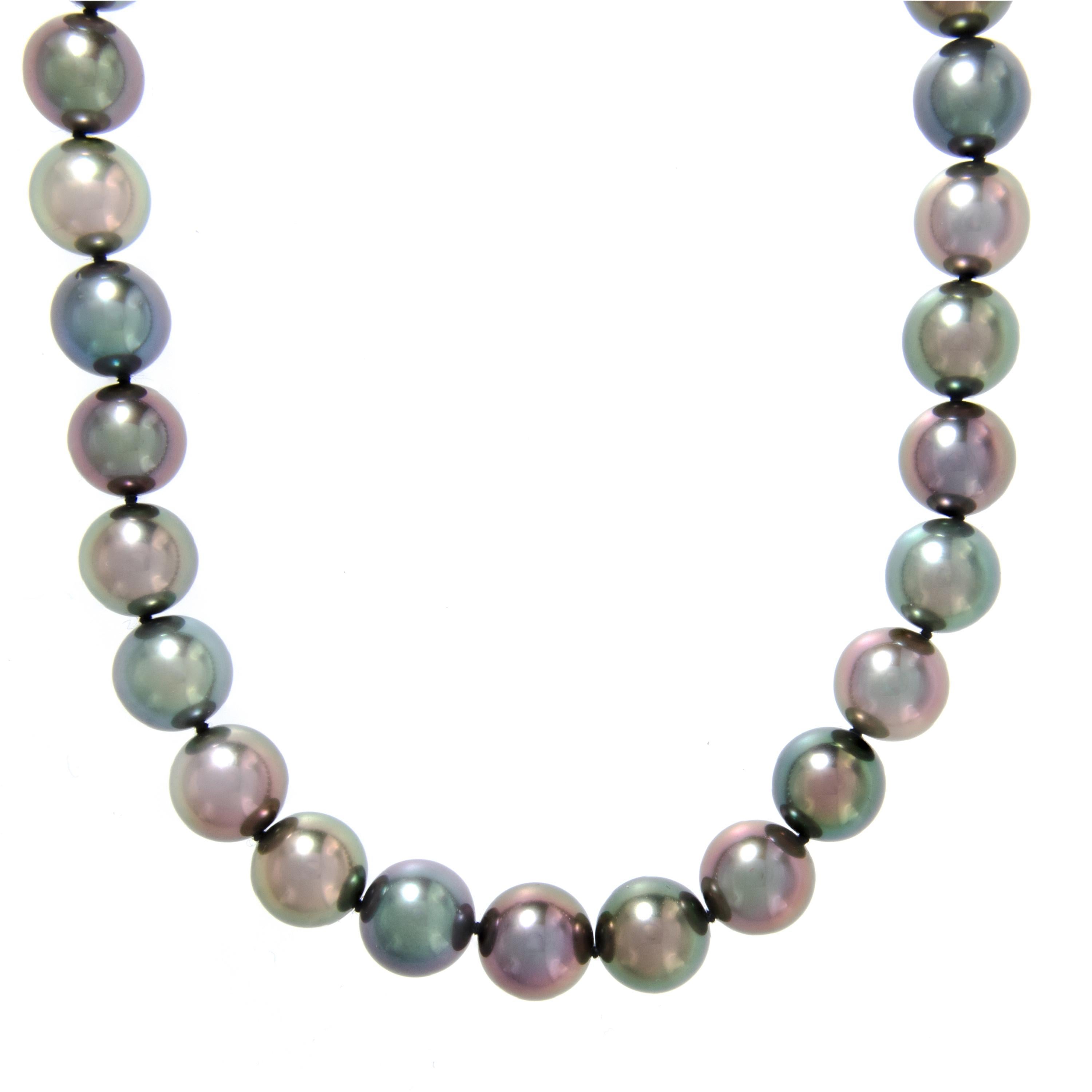 This necklace is comprised of 43 Tahitian cultured pearls graduating in size from 9-10 mm with an 18 karat white gold “X” clasp. Pearls are true AAA quality with excellent luster and clean surface. But what makes these pearls so eye-catching is the