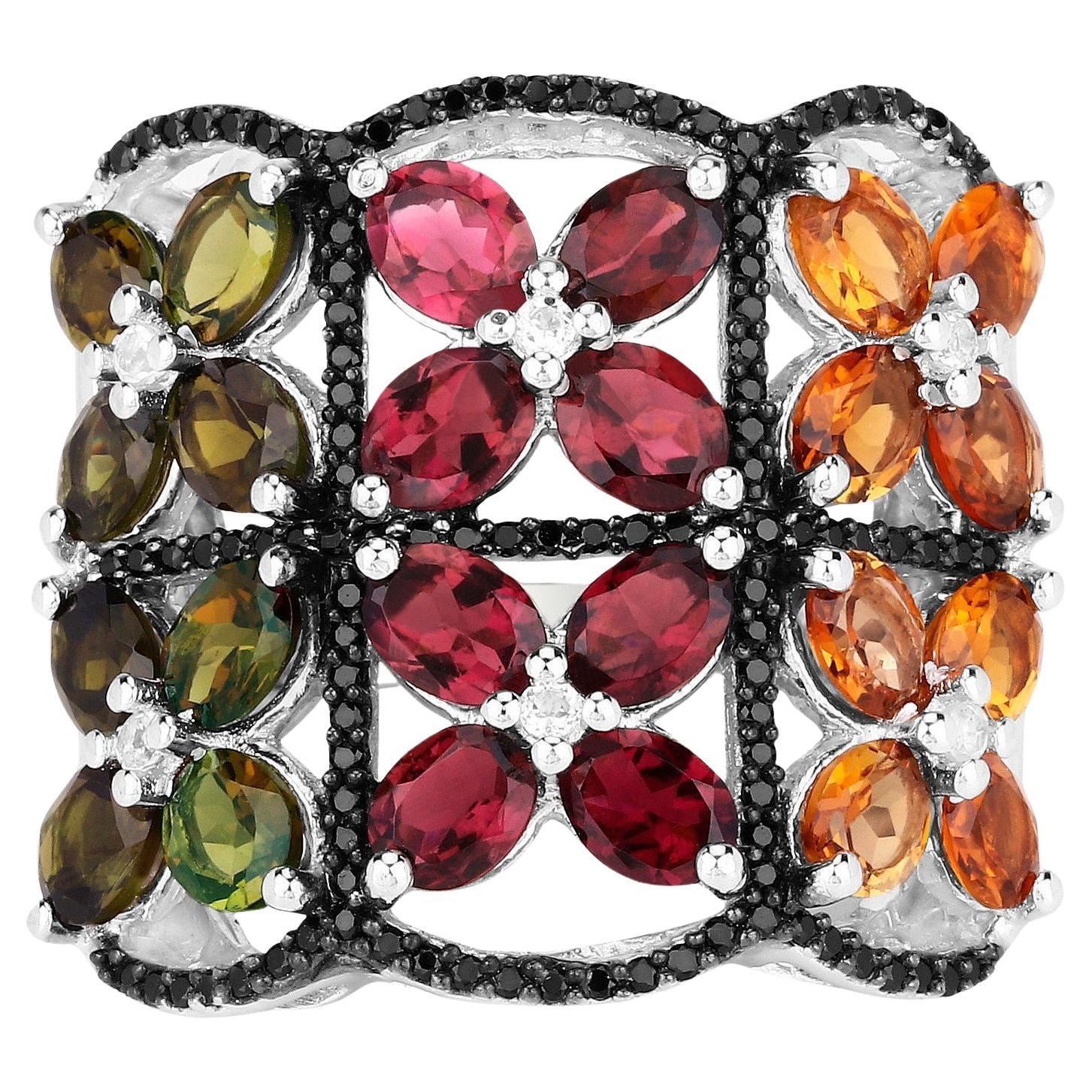 Bague en tourmaline multicolore avec topazes blanches et spinelles noires 8,38 carats