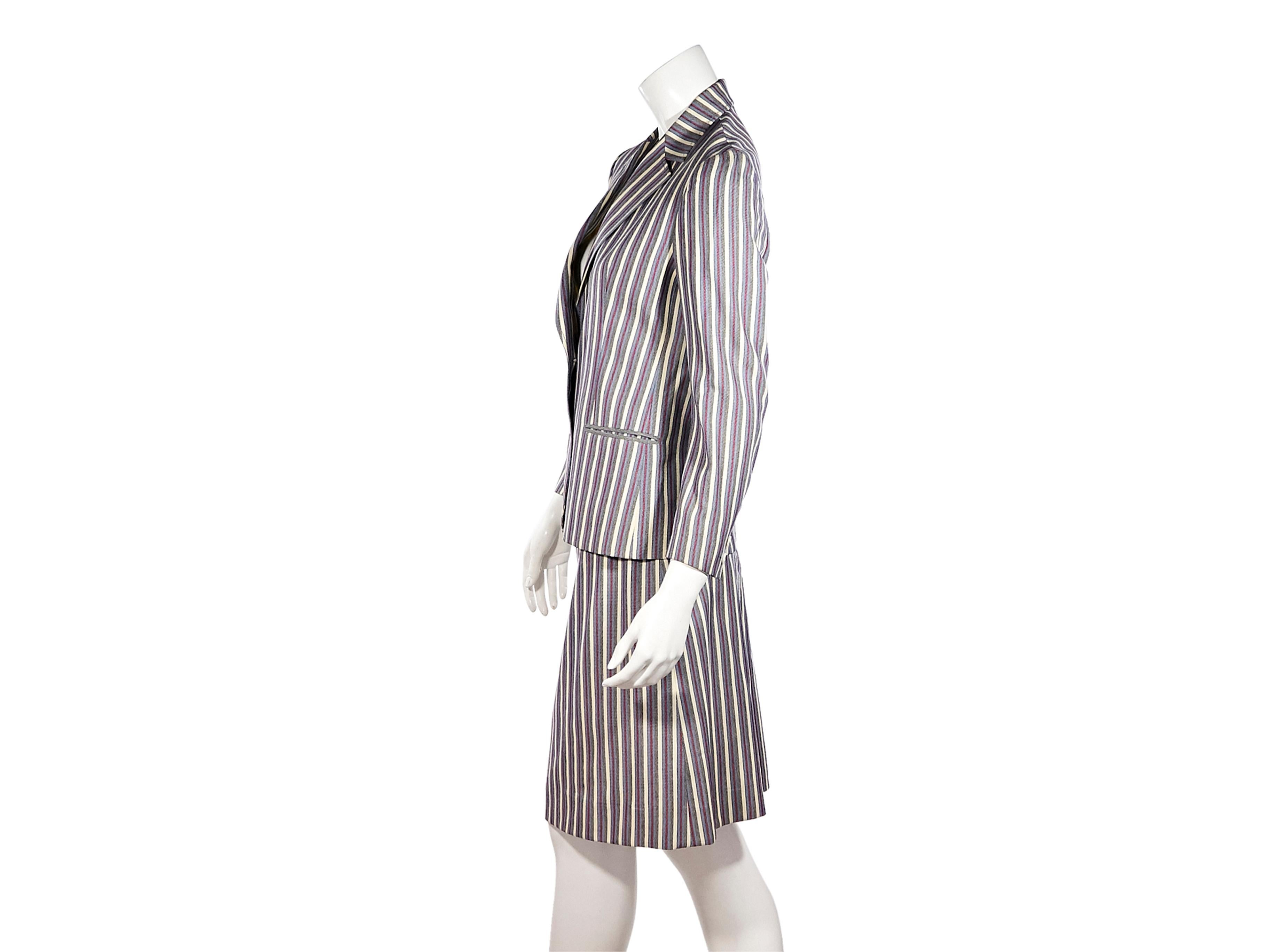 Product details:  Vintage multicolor striped wool skirt suit set by Celine.  Notched lapel.  Long sleeves.  Two-button detail at cuffs.  Button-front closure.  Besom waist pockets.  Matching pencil skirt.  Belted detail at waist.  Goldtone hardware.