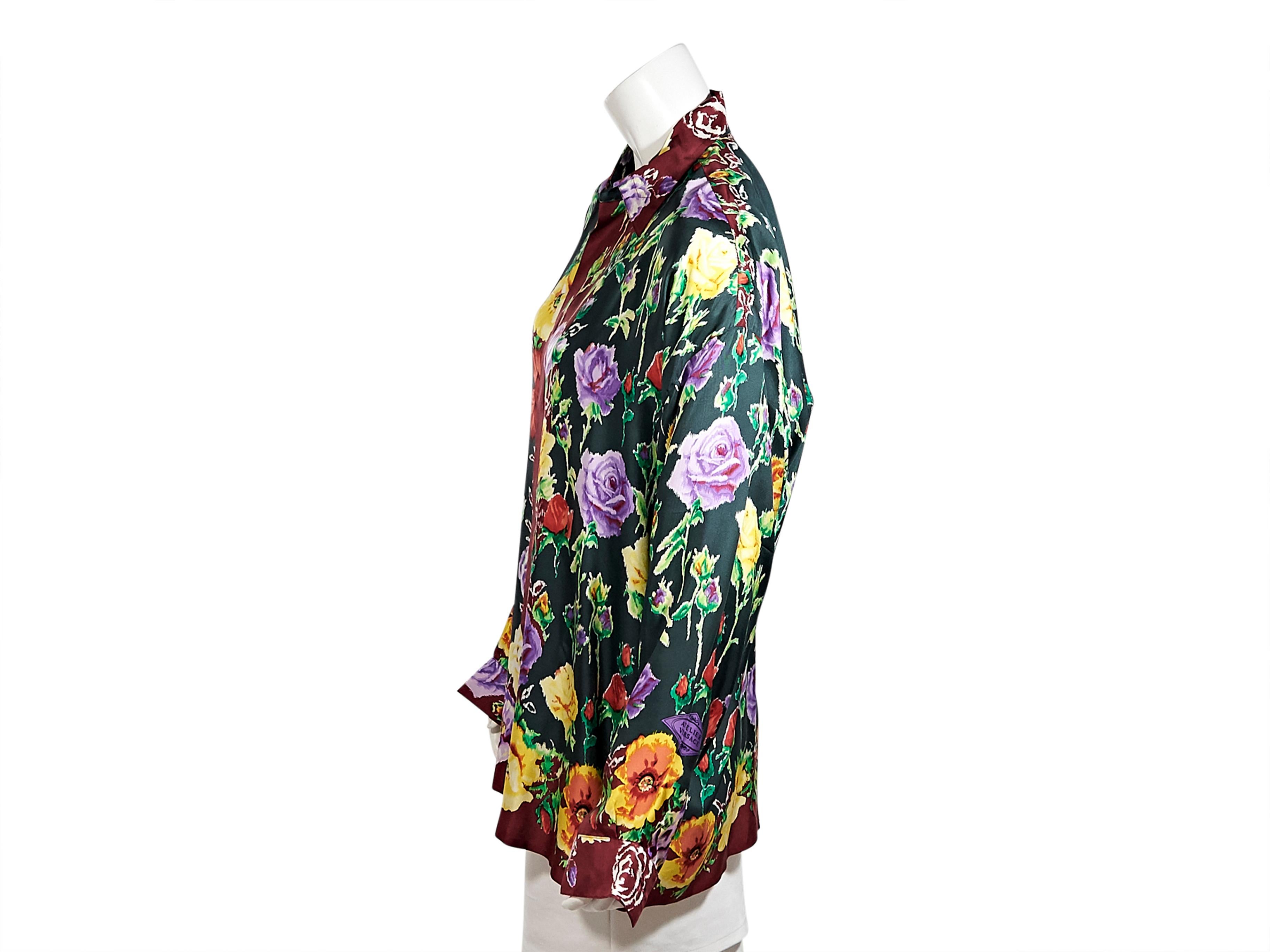 Product details:  Vintage multicolor floral-printed silk blouse by Gianni Versace.  Circa 1996.  Spread collar.  Long sleeves.  Single button cuffs.  Concealed button-front closure.  50