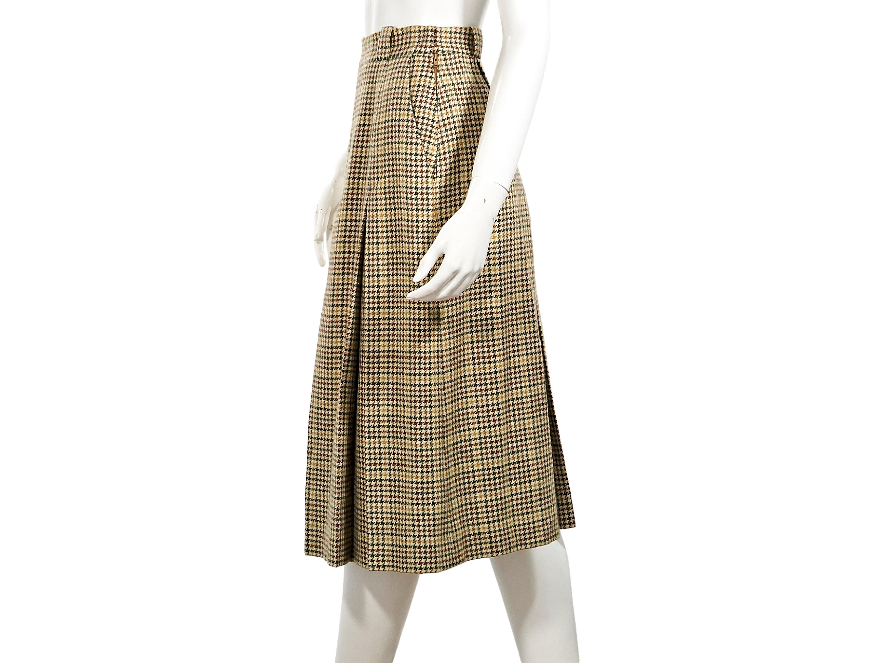 Product details:  Vintage multicolor houndstooth culottes by Hermes.  Banded waist.  Concealed side zip closure.  25