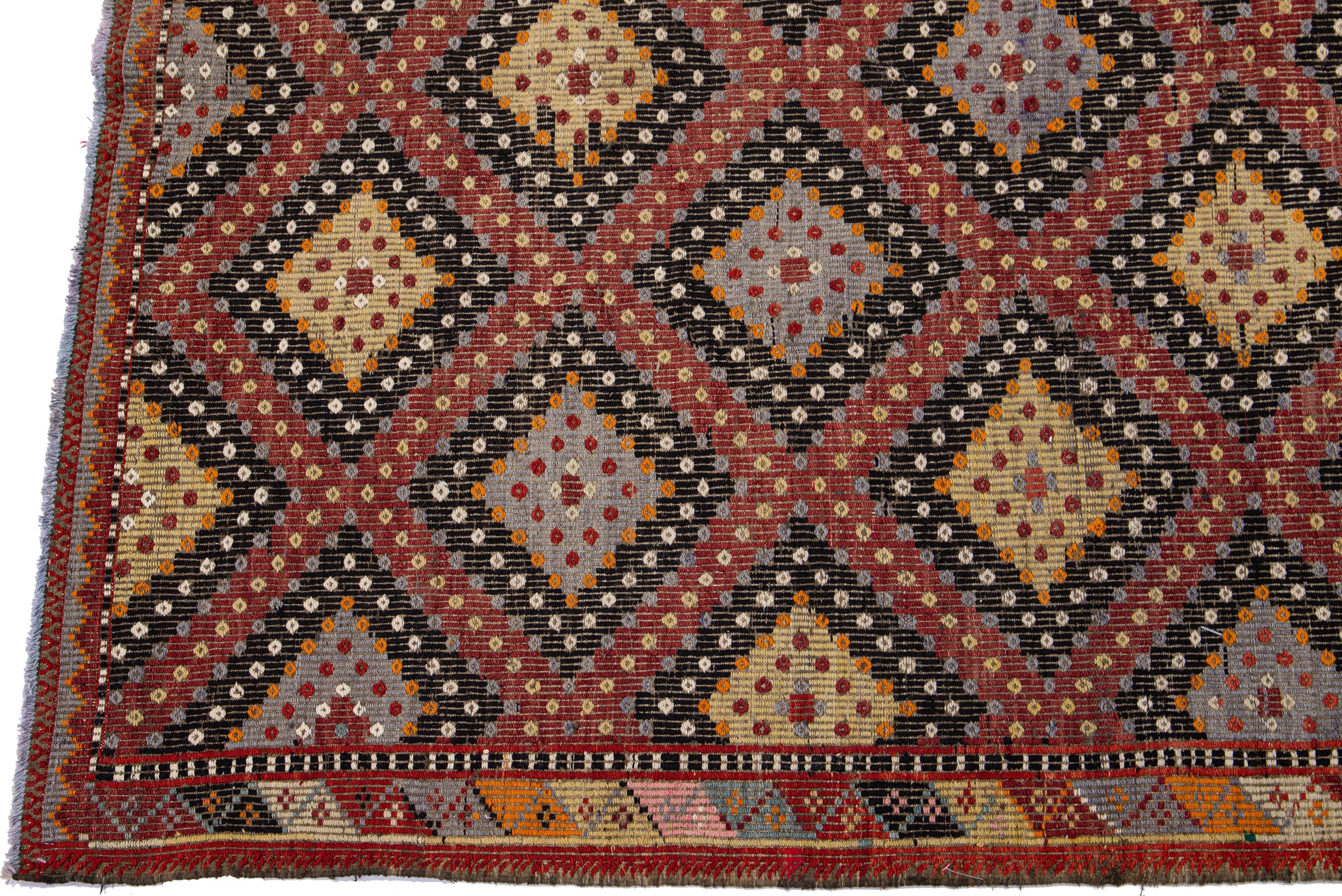 Bohemian Multicolor Vintage Sumakh Handmade Geometric Wool Rug For Sale