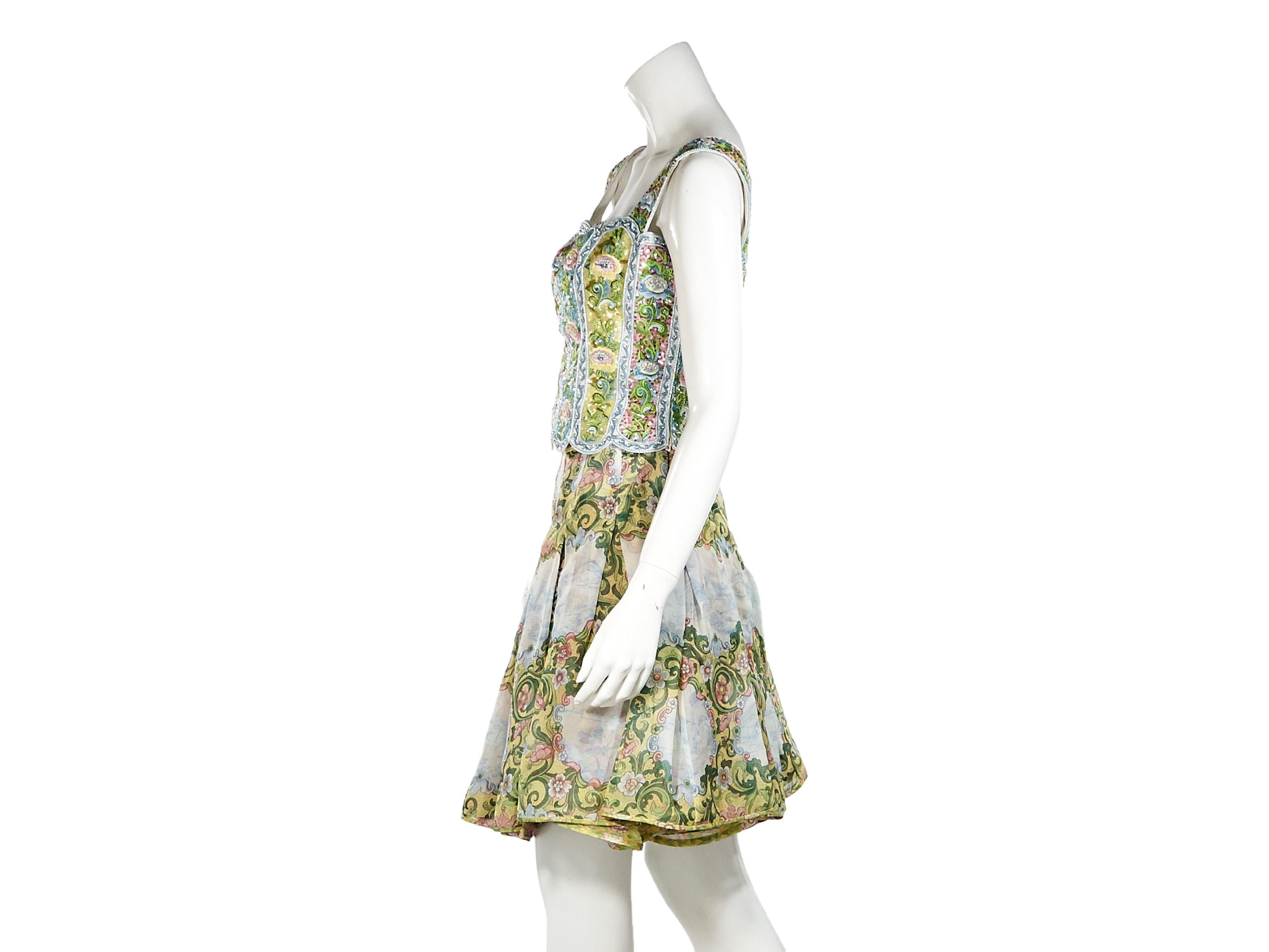 Product details:  Vintage pastel floral skirt set by Valentino.  Circa the 1980s.  Embroidered and beaded tank.  Scalloped squareneck.  Sleeveless.  Concealed side zip closure.  Matching pleated A-line skirt.  Banded waist.  Top:  29