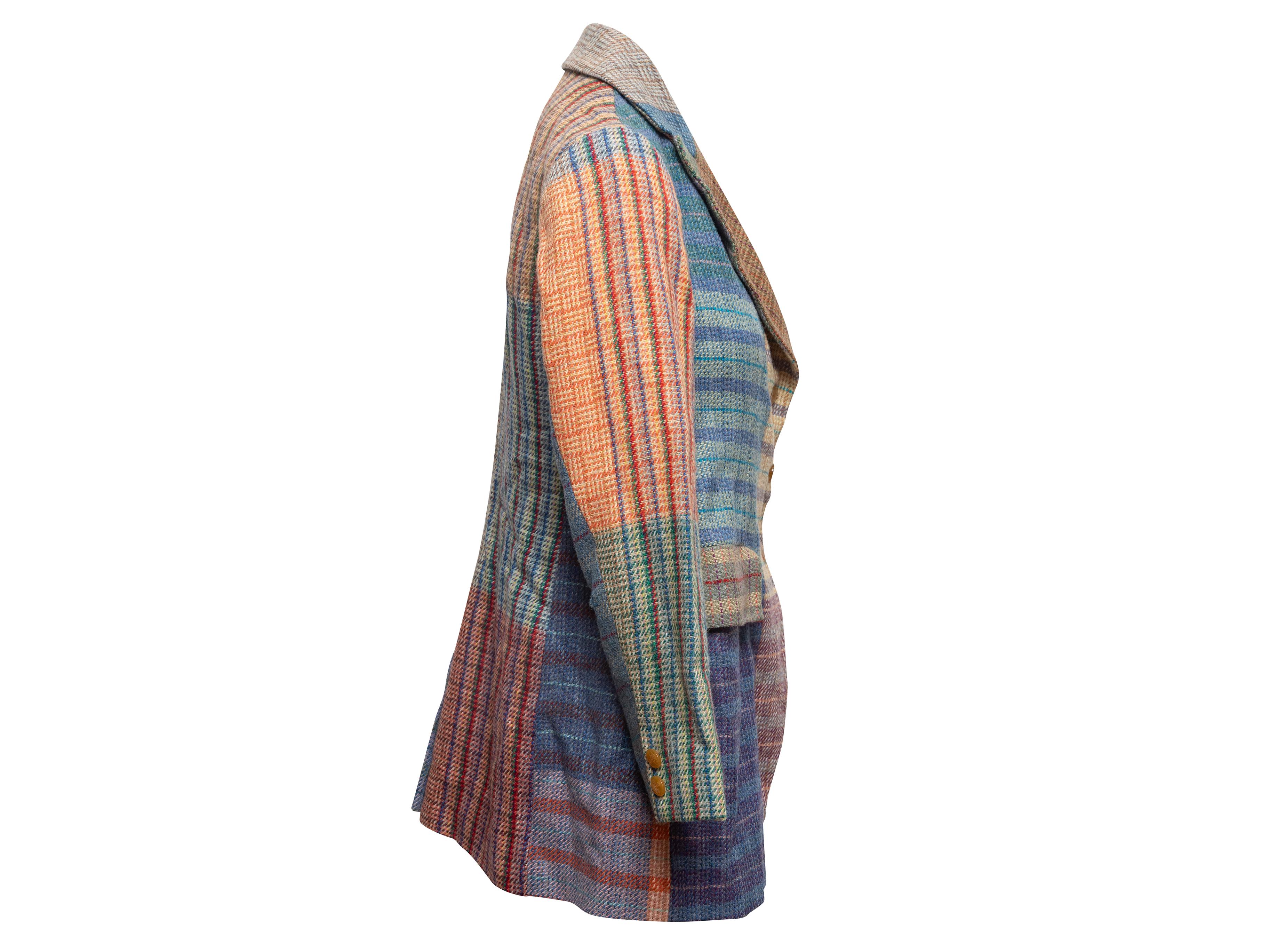 Multicolor wool rainbow plaid blazer by Vivienne Westwod. Notched lapel. Three front pockets. Front button closures. 34