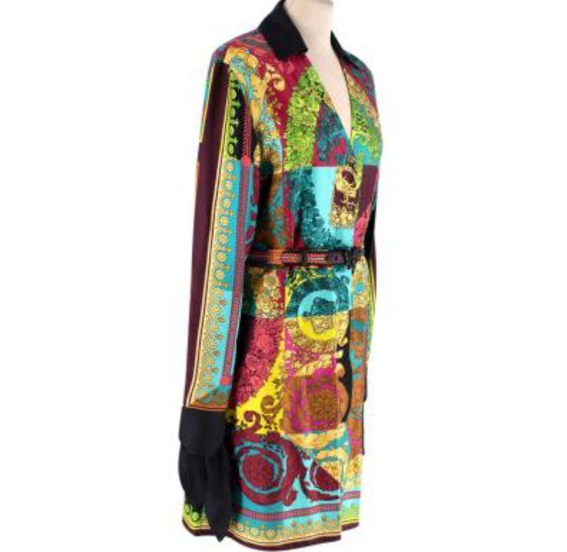 Versace Multicolor Voyage Barocco Printed Shirt Dress
 

 - Iconic Baroque-style print featuring the Medusa head and regal crowns and scrolls on a multicolour background
 - Collar, button-through 
 - Self tie decorative cuffs, and narrow tonal belt
