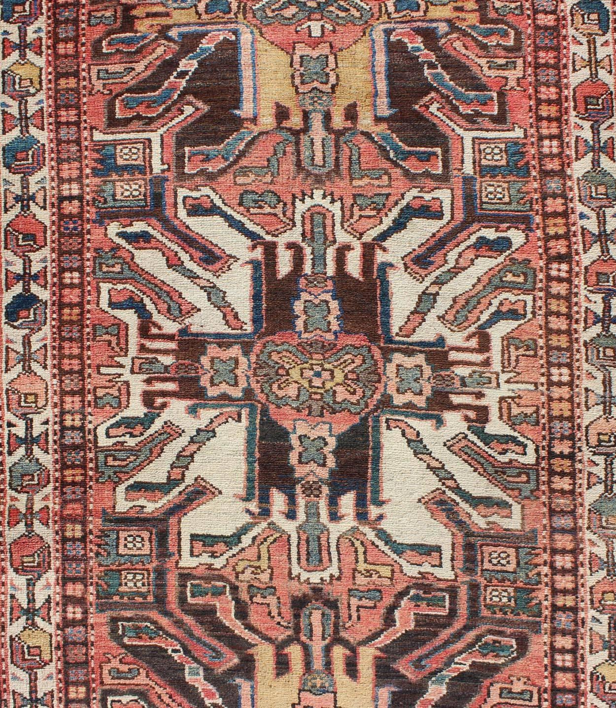 Early 20th Century Multicolored Antique Persian Karajeh Runner with Geometric-Tribal Medallions For Sale