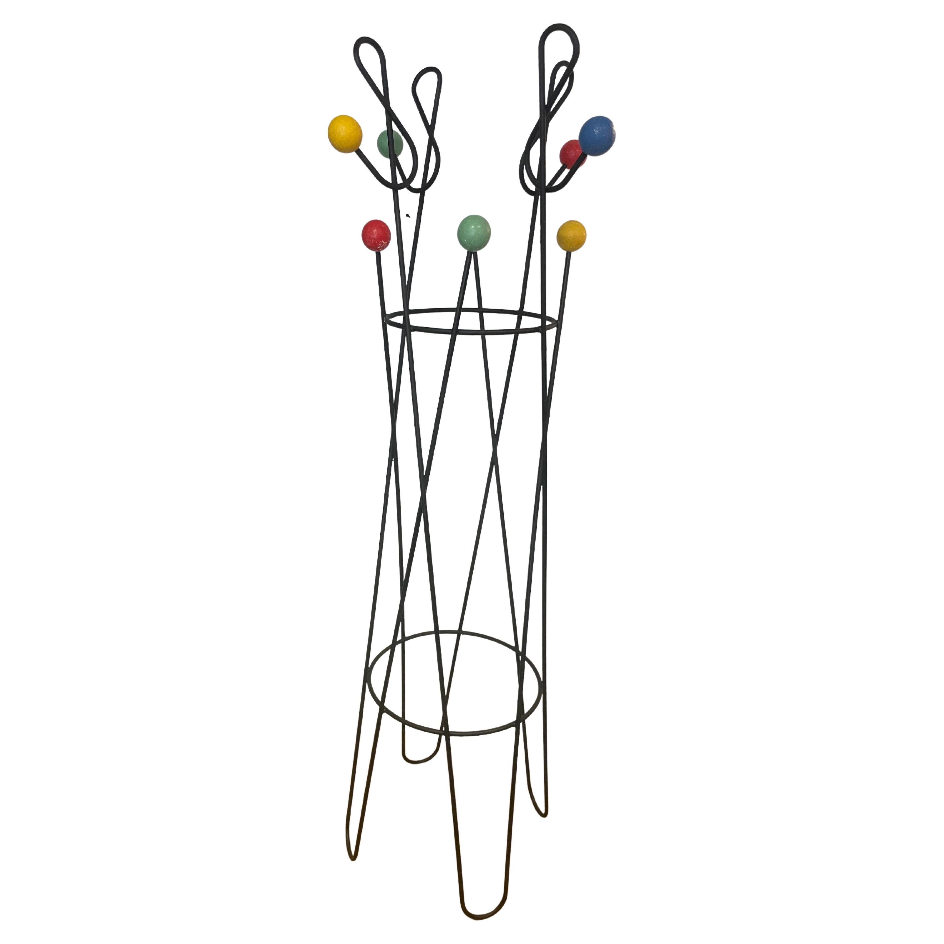 Sourced by Martyn Lawrence Bullard at auction in Paris, France
Wrought iron and multicolored coat rack.
Inspired by Scandinavian influence, this coat rack provides whimsy and sophistication to any space.