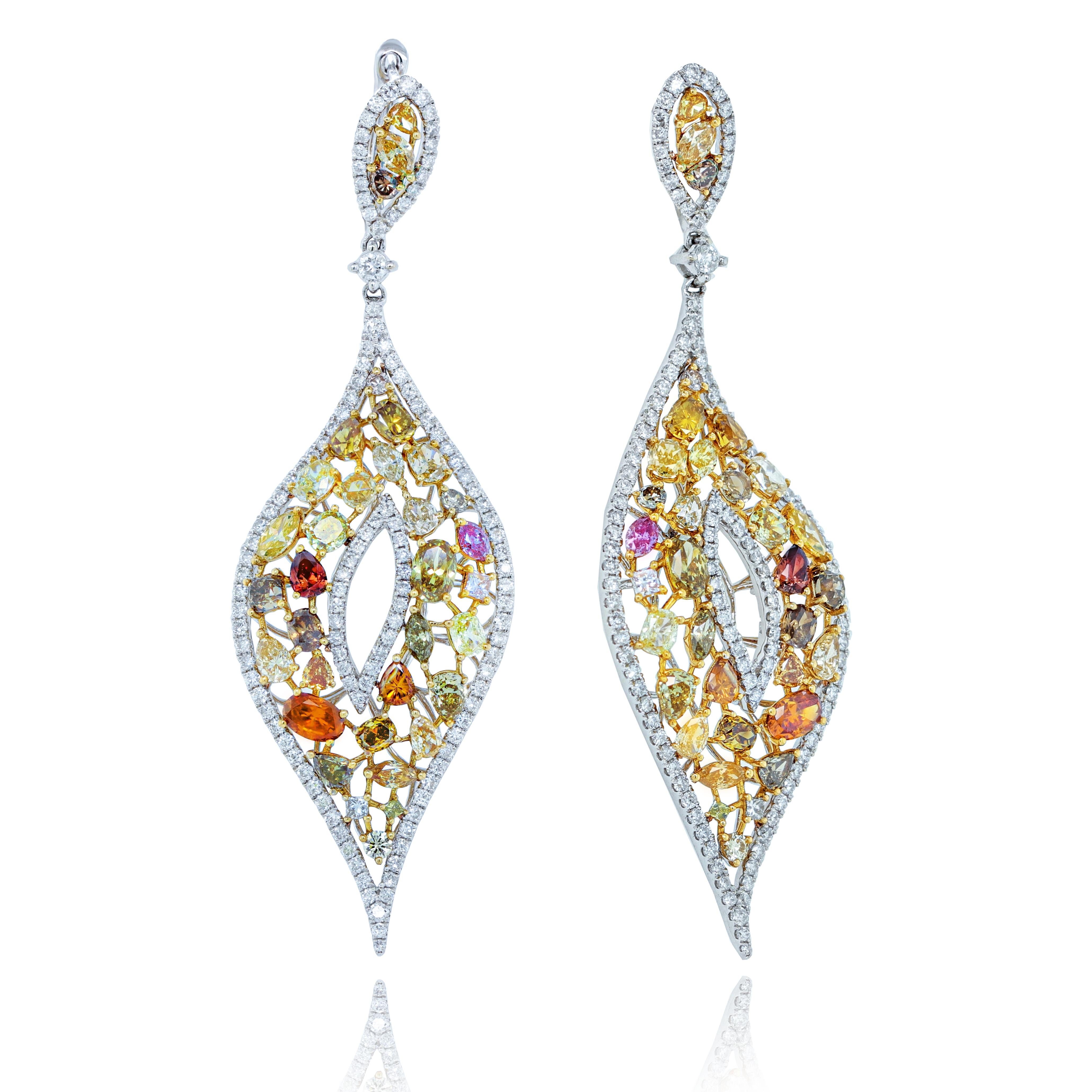 18K White and Yellow gold  diamond earrings features 11.50 carats of multi-colored diamonds, yellow, brown and white diamonds. 
