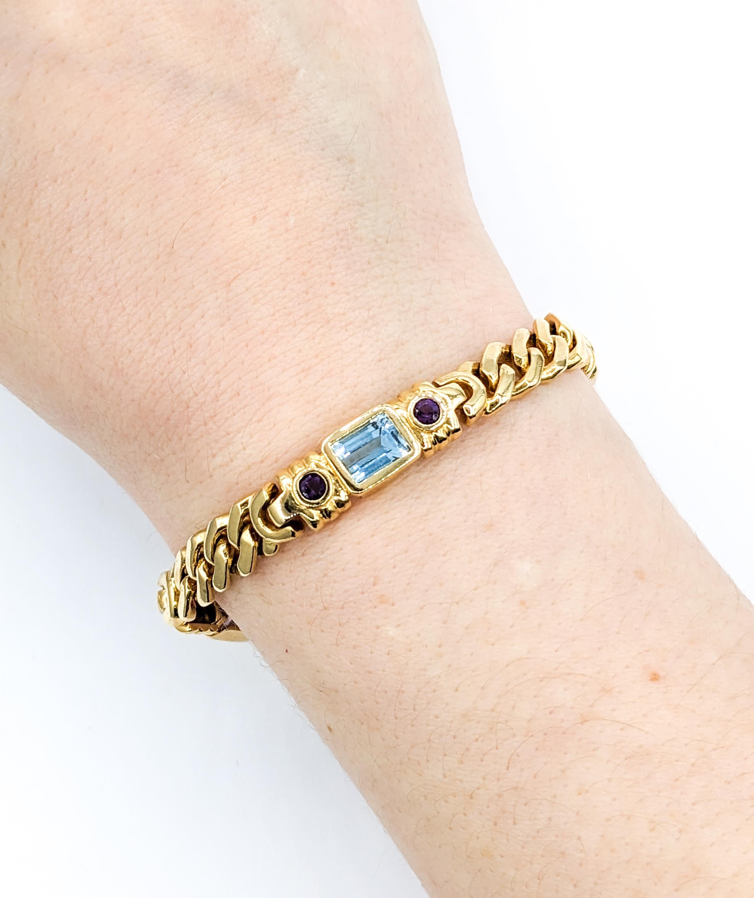 Mehrfarbiges Edelstein & 14K Gold Gliederarmband

Dieses elegante Armband ist aus 14-karätigem Gelbgold gefertigt und mit Granat, blauem Topas, Amethyst und Citrin verziert. Dieses Armband misst 7 1/2 Zoll in der Länge; das Gesamtgewicht beträgt
