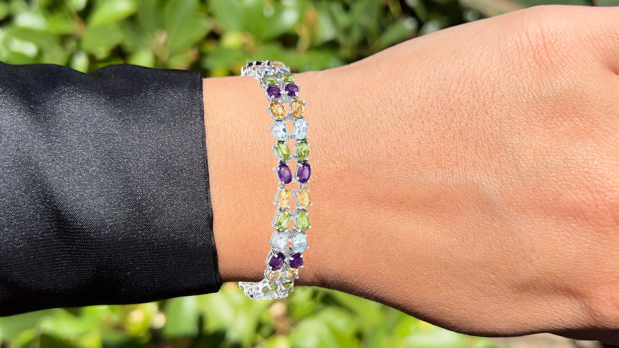 Es kommt mit dem Gemmologischen Gutachten von GIA GG/AJP
Alle Edelsteine sind natürlichen Ursprungs
16 Amethyste = 4,24 Karat
16 Blautopase = 5,24 Karat
16 Peridots = 4,64 Karat
16 Zitrine = 4,48 Karat
Metall: Rhodiniertes Sterling Silber
Länge: