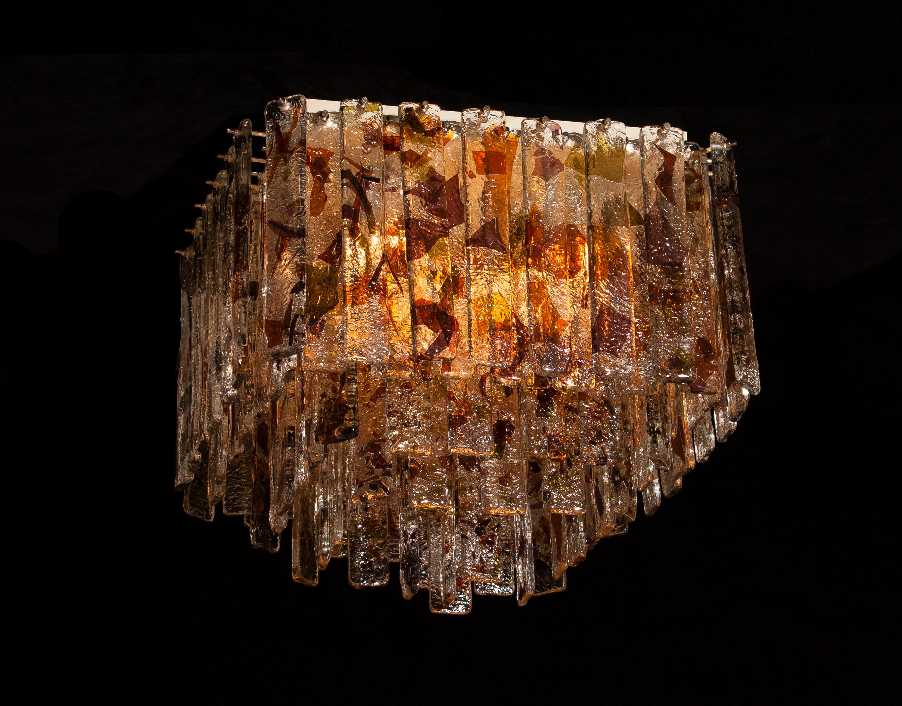 Stunning Italian Mid-Century Modern squared ceiling lamp by Mazzega. 
95 pieces of clear crystal elements measuring 28cm each. 
The glass hangs on hooks and pins onto a white lacquered metal frame, as pictured.
The elements have three colours