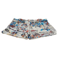 Multicolored John Galliano Shorts with Newspapers and fishes prints 