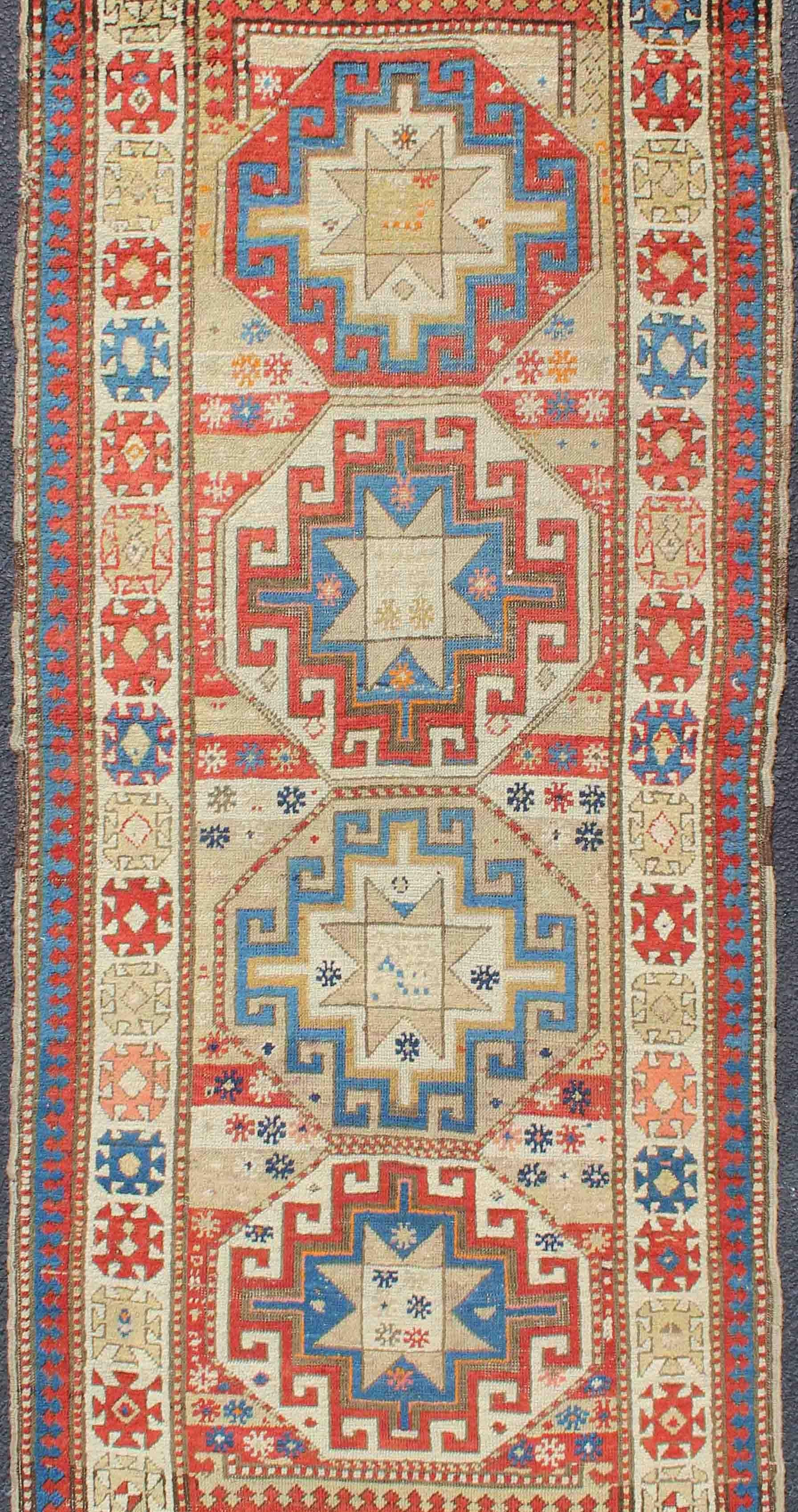 Hand-Knotted Multicolored Medallion Antique Caucasian Kazak Rug with Geometric Medallions For Sale