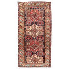 Mehrfarbiger antiker kaukasischer Kazak-Teppich mit geometrischen Motiven
