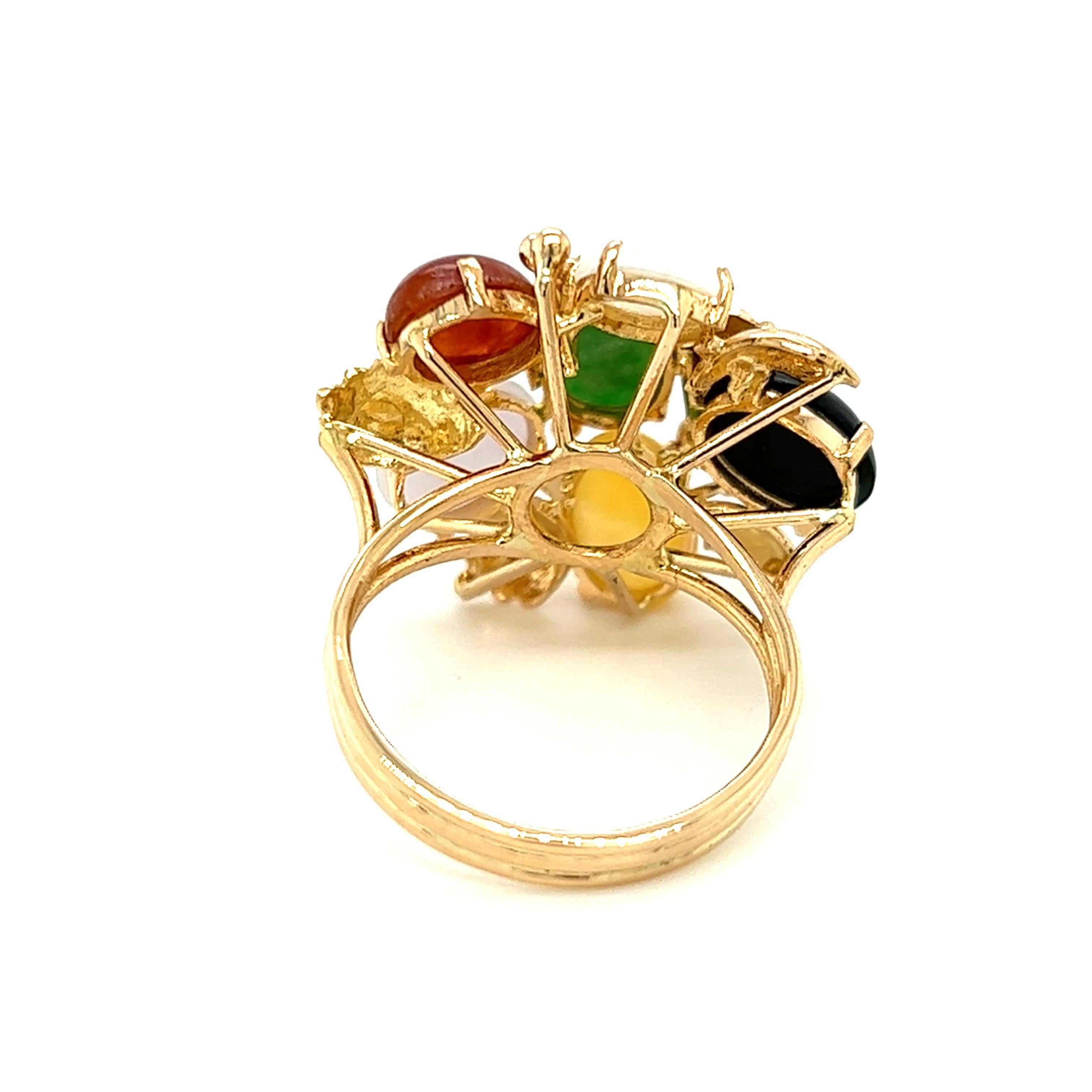 The multi-colored jade ring has six 8x6 genuine jade gemstones with natural multi-colored pieces of jade. The gorgeous cluster jade ring has a center, traditional green jade gemstone set in four prongs. The green jade gemstones are framed by genuine