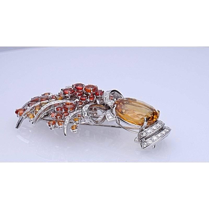 Modern Multicolored Sapphire Diamond Topaz 18 kt. White Gold Bow Brooch For Sale