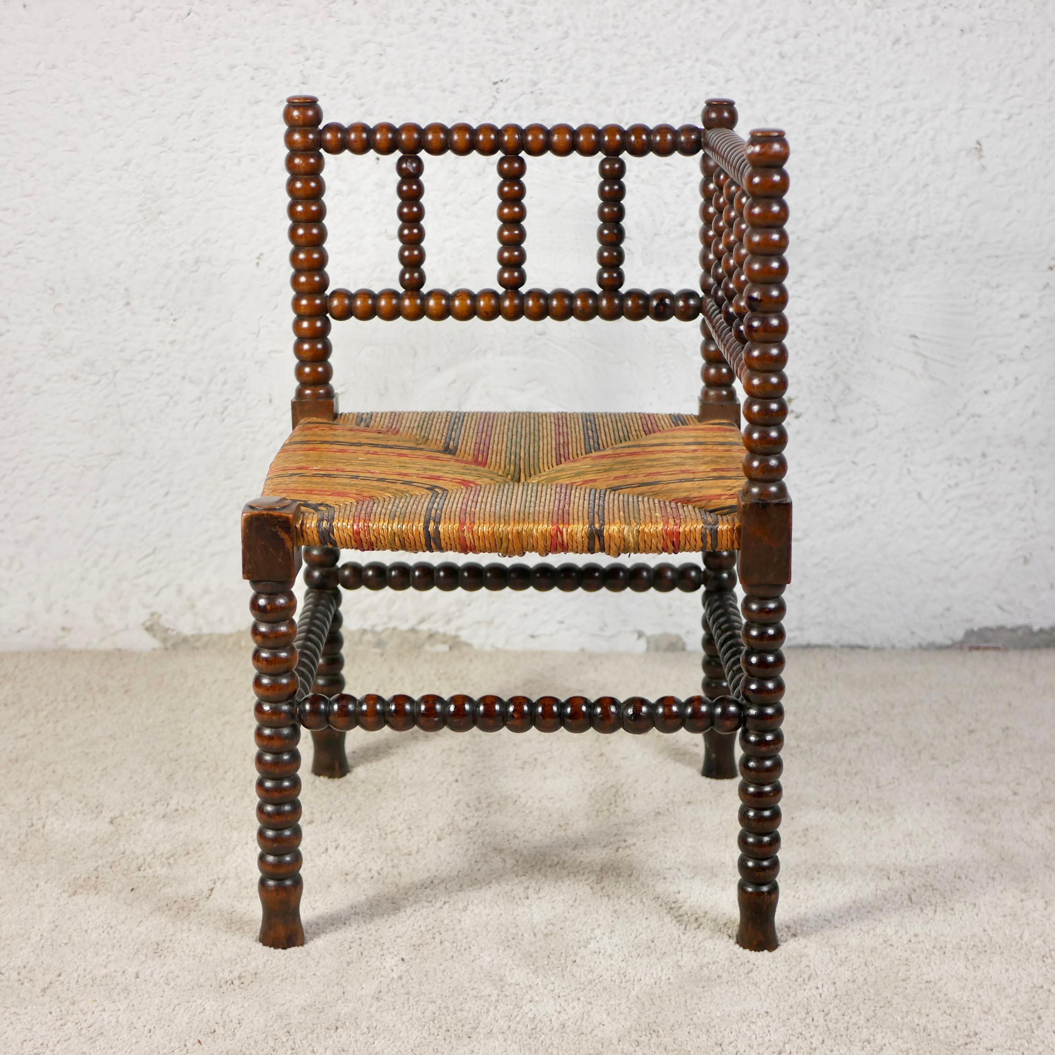 French Provincial Multicolored seat Bobbin corner chair, France, early 20th century For Sale