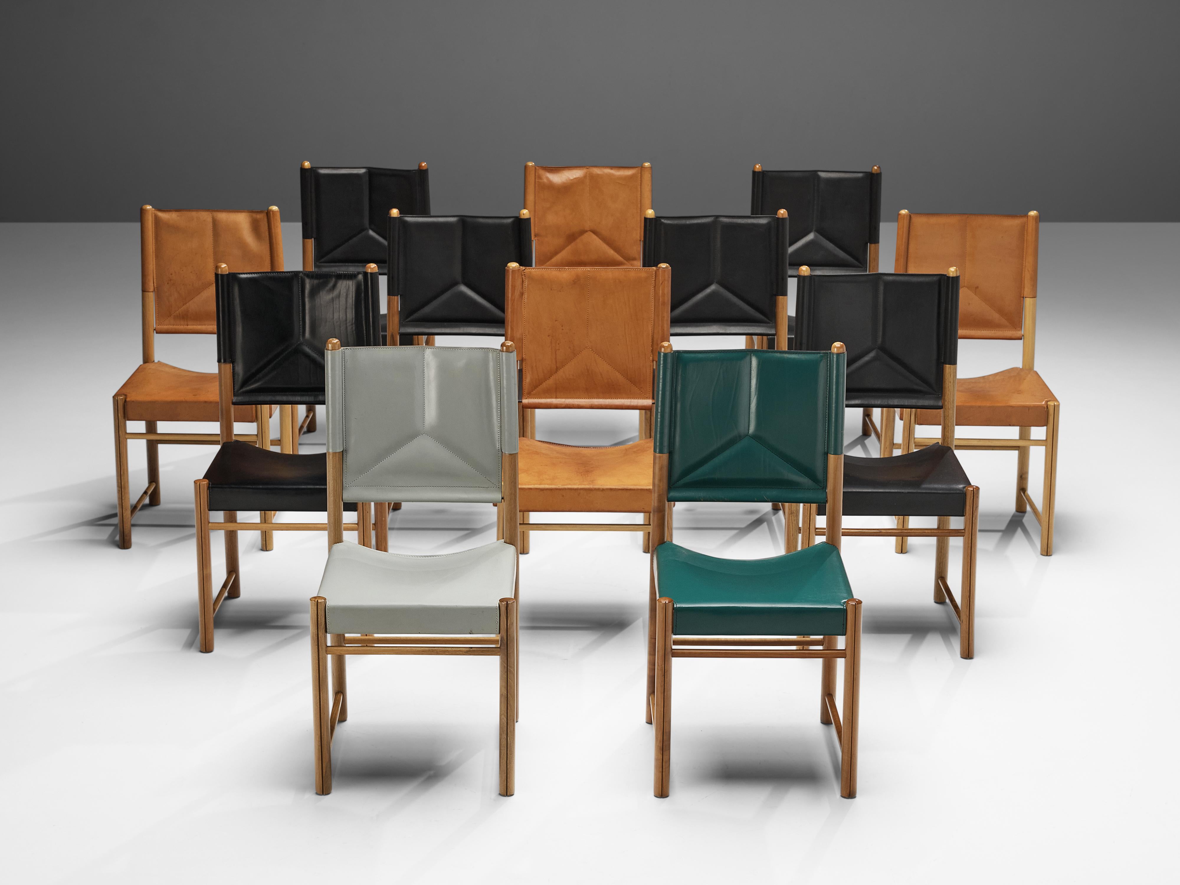 Set of dining chairs, leather, walnut, Italy, 1980s

This striking set of dining chairs surprises with a color range from green, black and grey to cognac. Together the colorful leather seats and backrests form an admirable set. The curved seat and