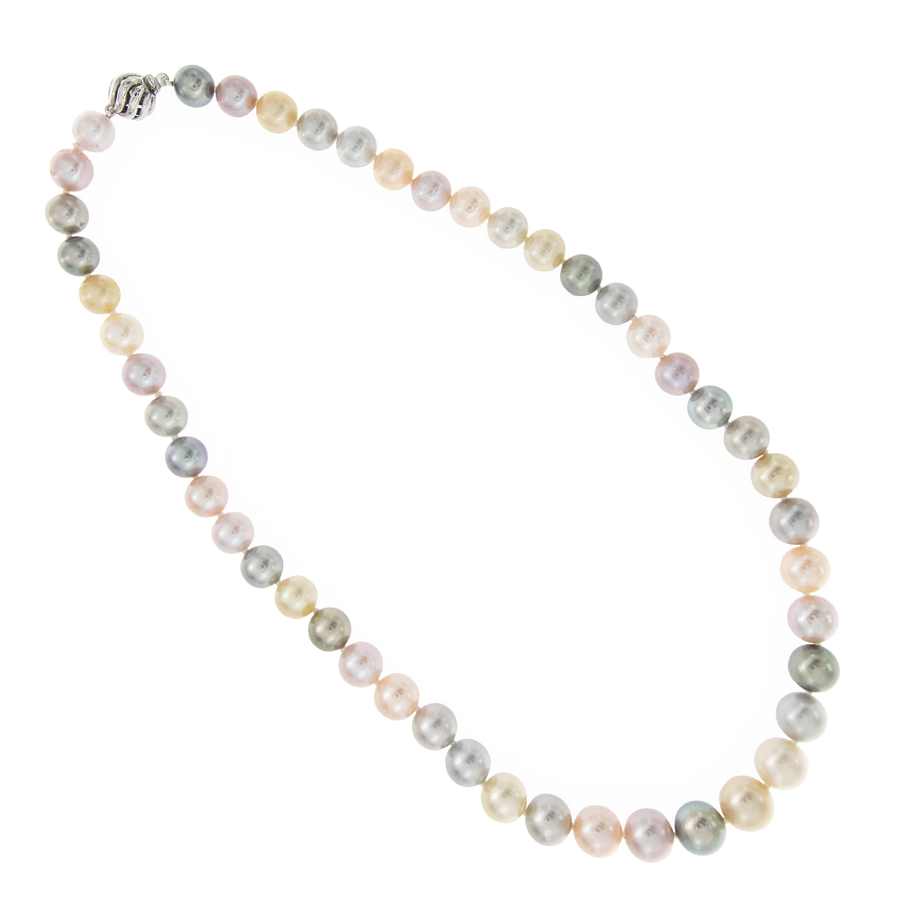 Mixing South Sea pearls with freshwater pearls creates a stunning look for a single strand. This necklace encompasses colorful layers creating a pretty gradient of pastels. Necklace is comprised of 47 pearls, 8 mm - 10 mm. Clasp is 14k white gold.