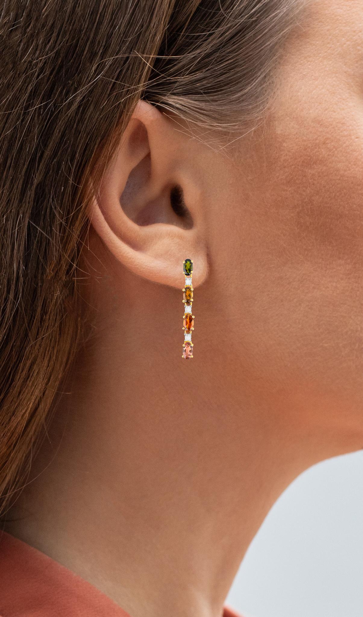 It comes with the Gemological Appraisal by GIA GG/AJP
All Gemstones are Natural
8 Multicolored Tourmalines = 1.70 Carats
Colors: Pink, Green, Brown, Orange
6 White Topazes = 0.25 Carats
Metal: 18K Yellow Gold Plated Sterling Silver
Dimensions: 30 x