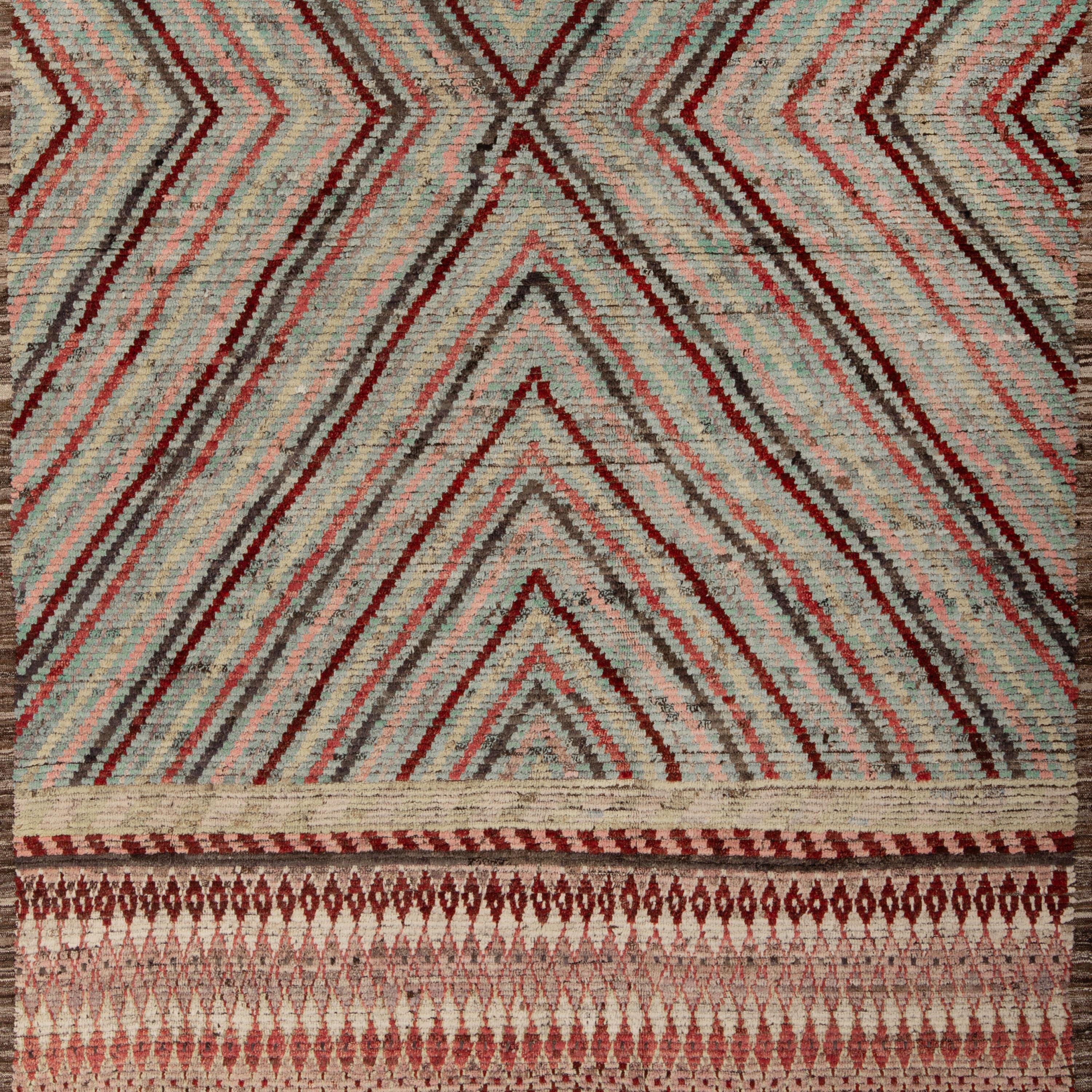 Inspired by the grounding foundations of Earth's natural colors and pure materials, this Zameen Multicolored Geometric Transitional Wool Rug - 7'2
