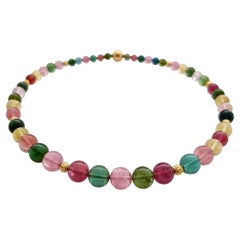 Collana di perline con tormalina rotonda multicolore e oro giallo 18 carati