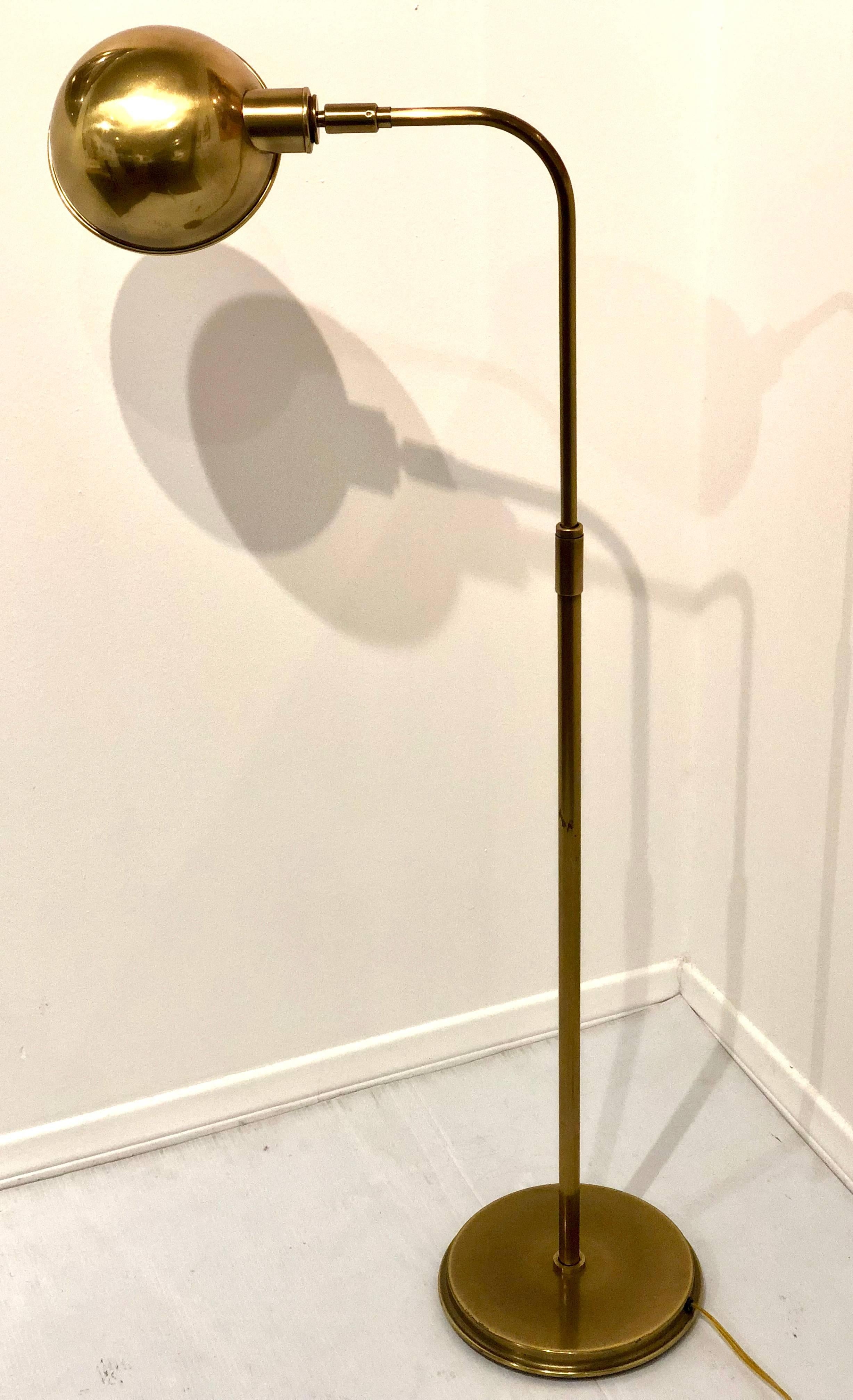 Nice simple design on this pharmacy in patinated brass finish by Frederick Copper lighting with dimmer switch and multidirectional lampshade, the lamp goes up and down, and rotates to 360 degree, and its in great condition.